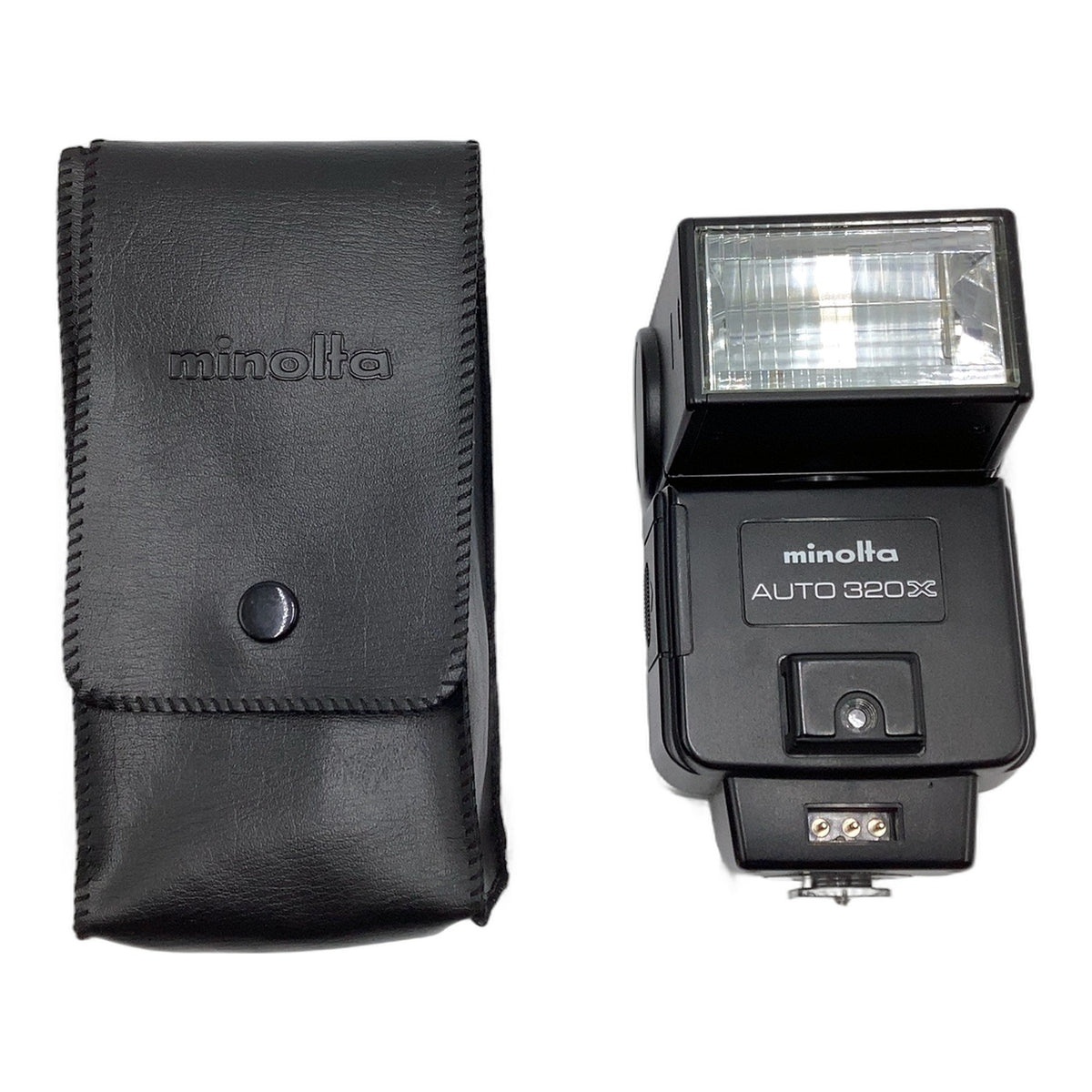 Minolta Auto 320X Blitzgerät Kamera Blitz Aufsteckblitz Flash Licht mit Tasche