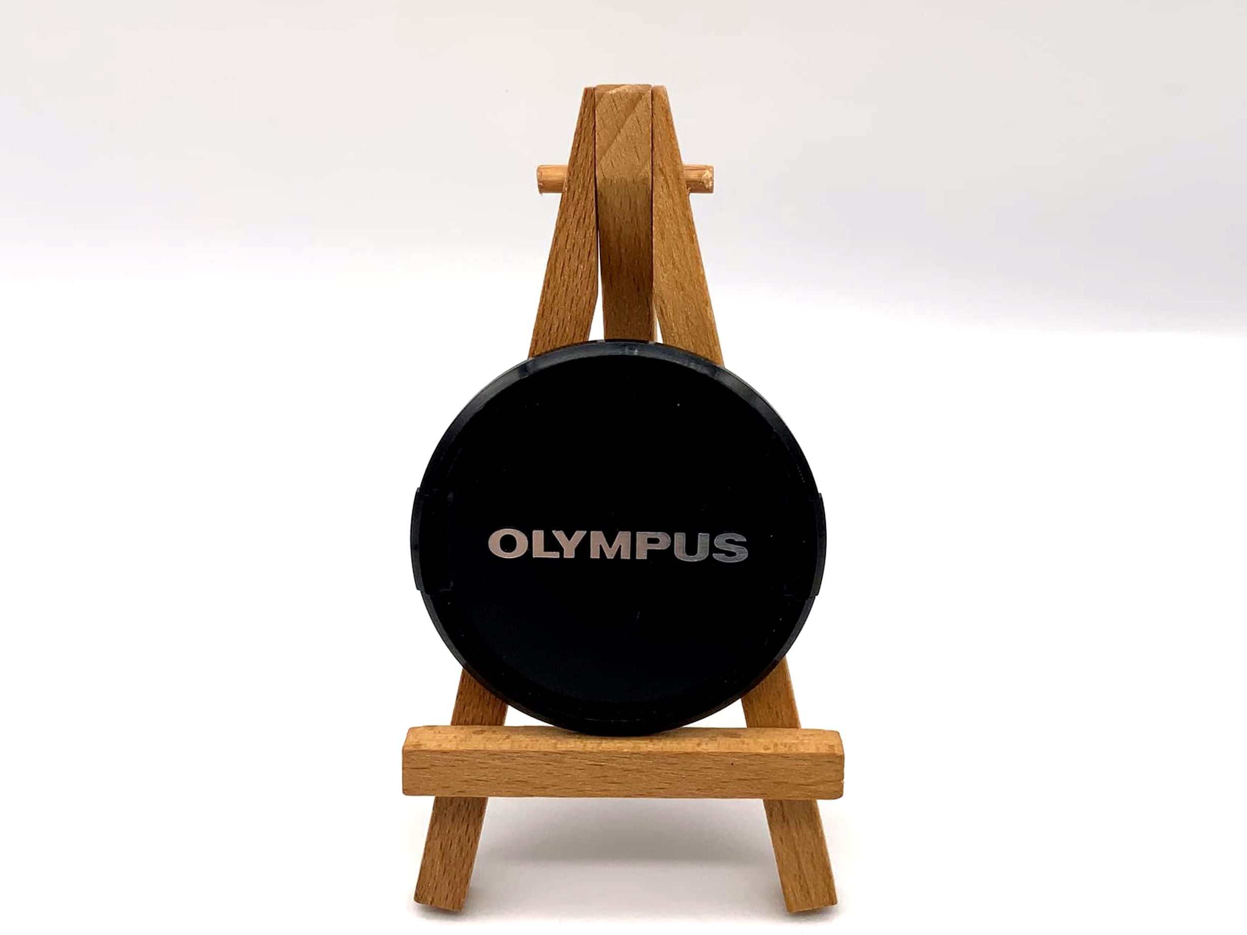 Olympus 55mm lens front cap