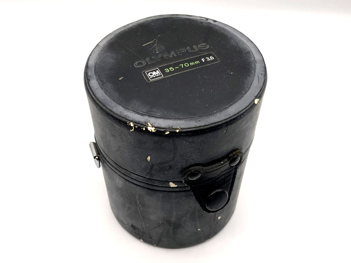 Olympus lens case, black, approx. 11x9cm, for OM system 35-70mm F3.6 lens.