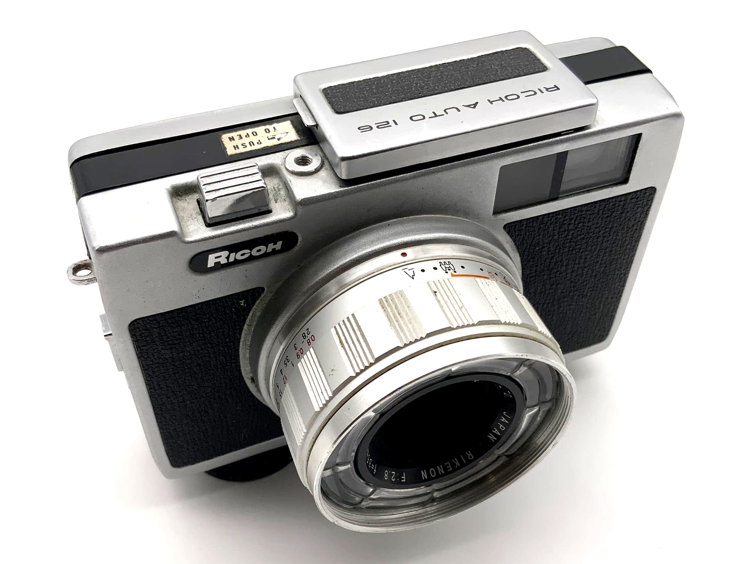 Ricoh Auto 126 viewfinder camera with Rikenon 35mm 1:2.8 lens, 126 film compact camera
