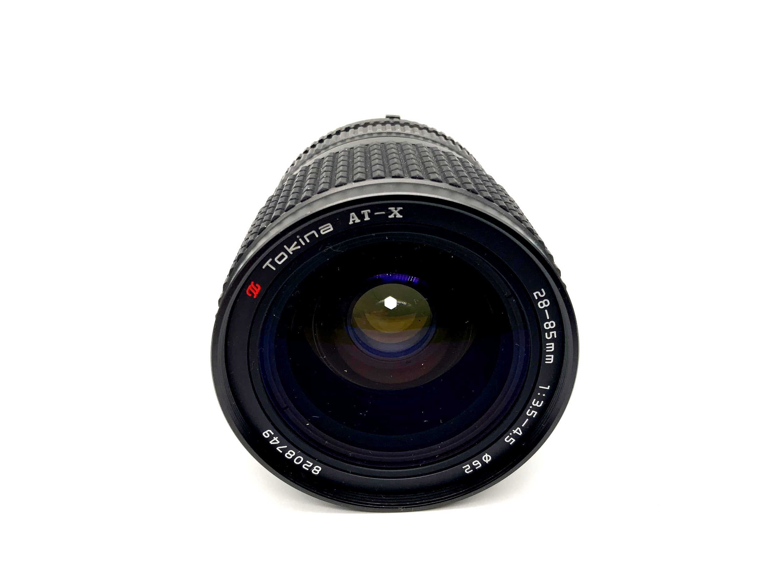 Tokina 28-85mm 1:3.5-4.5 lens AT-X close focus camera Camera Lens (Nikon F)