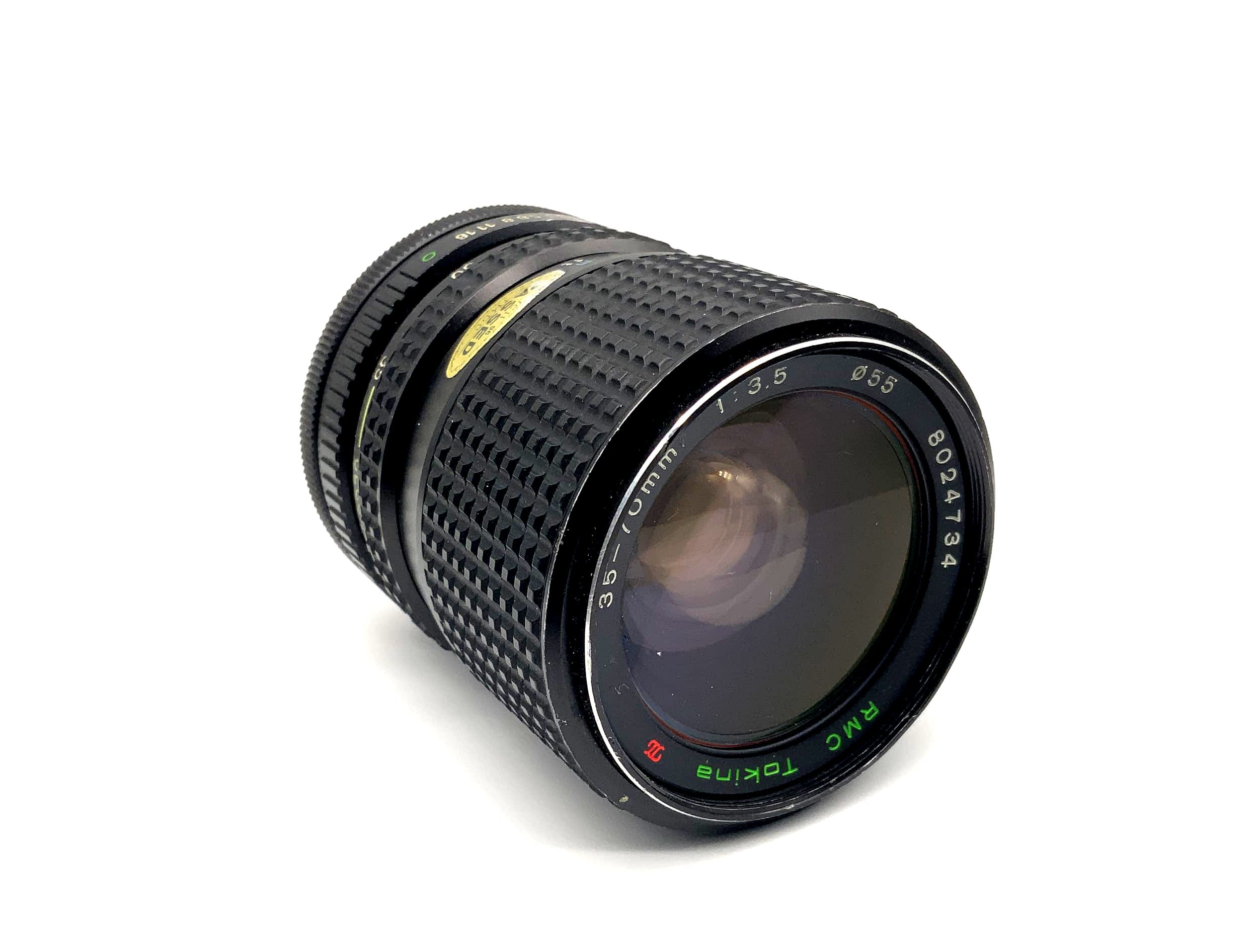 Tokina 35-70mm 1:3.5 Lens RMC Close Focus Camera Lens (Canon FD)