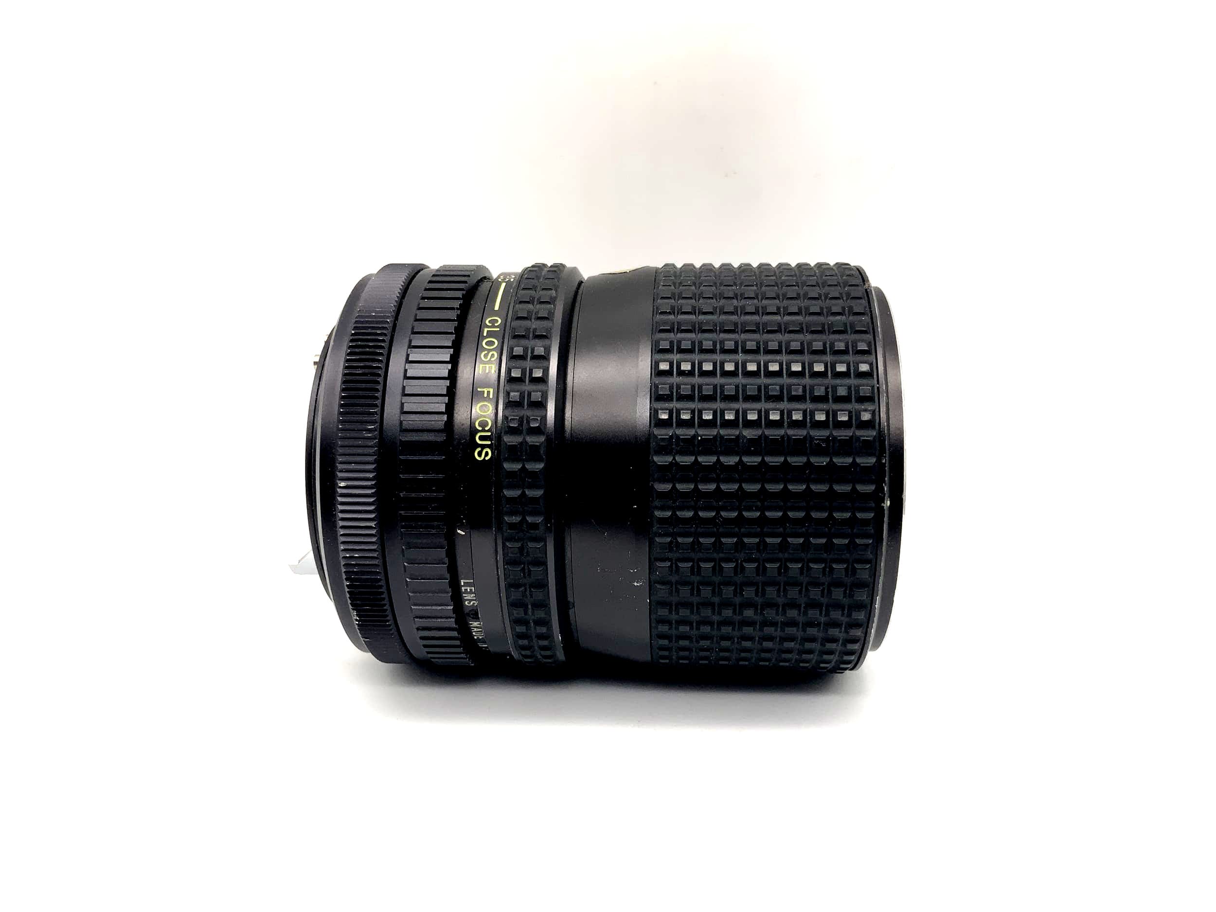 Tokina 35-70mm 1:3.5 Lens RMC Close Focus Camera Lens (Canon FD)