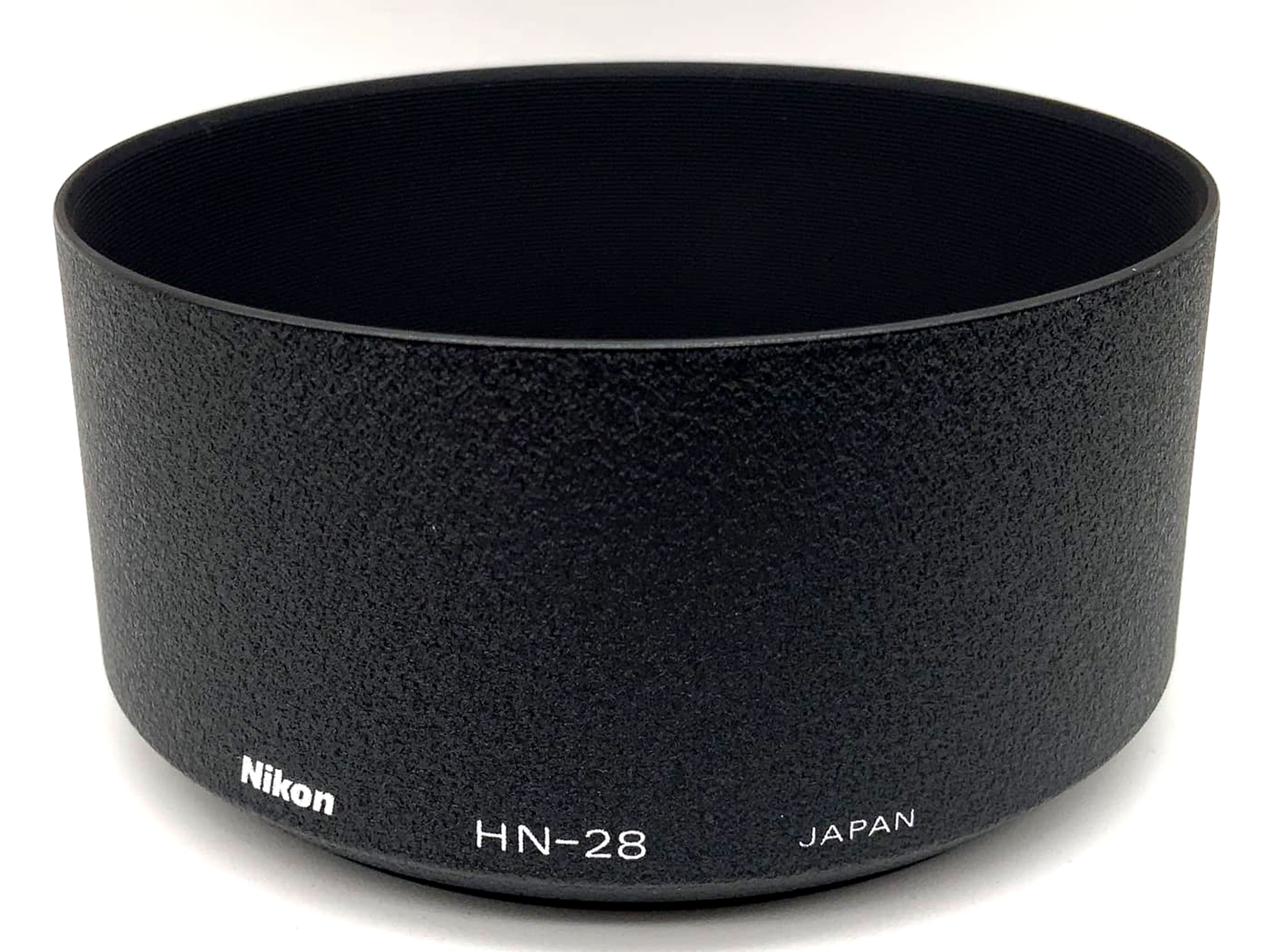 Nikon HN-28 in original packaging, screw-in lens hood for AF Zoom Nikkor 80-200mm f/2.8 ED lens.