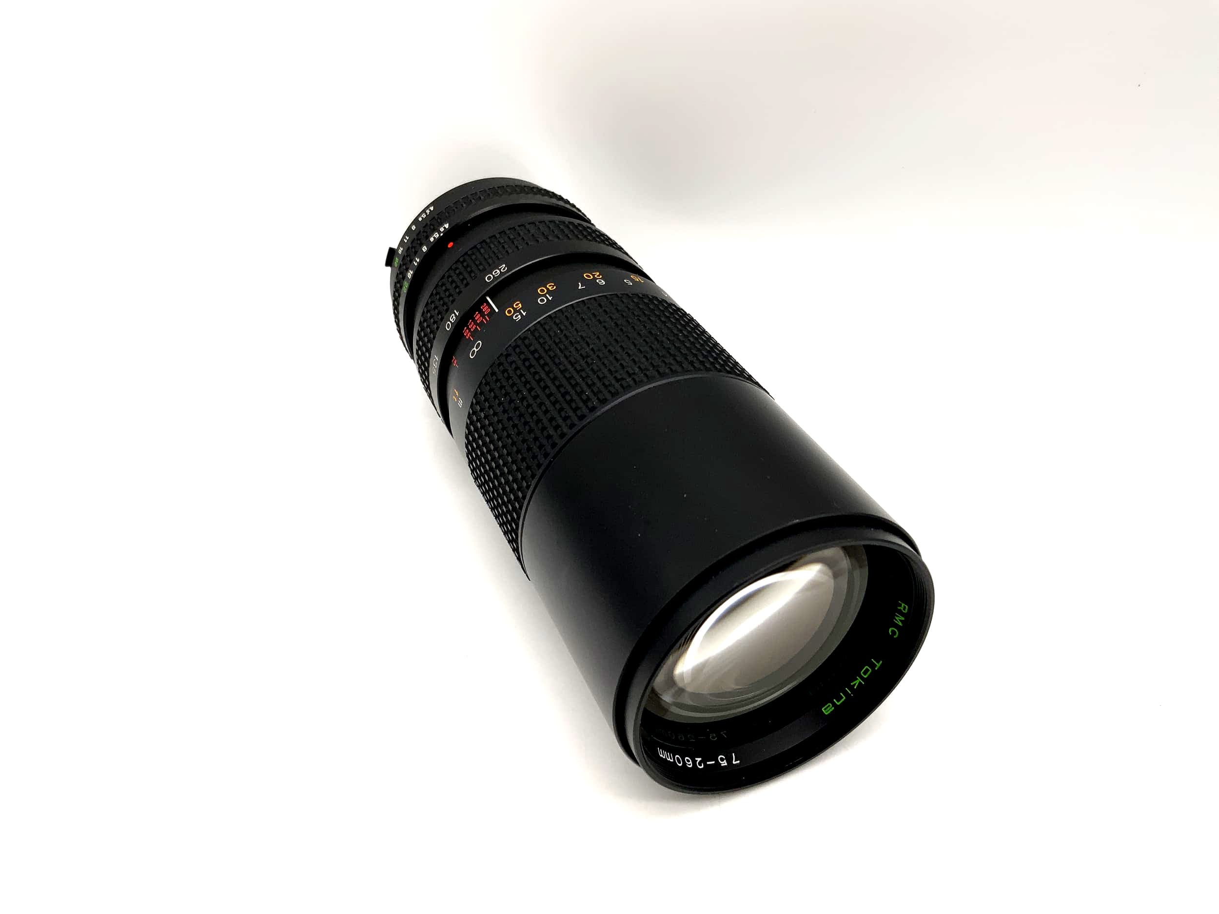 Tokina 75-260mm 1:4.5 Lens RMC Close Focus Camera Lens (Minolta MD)