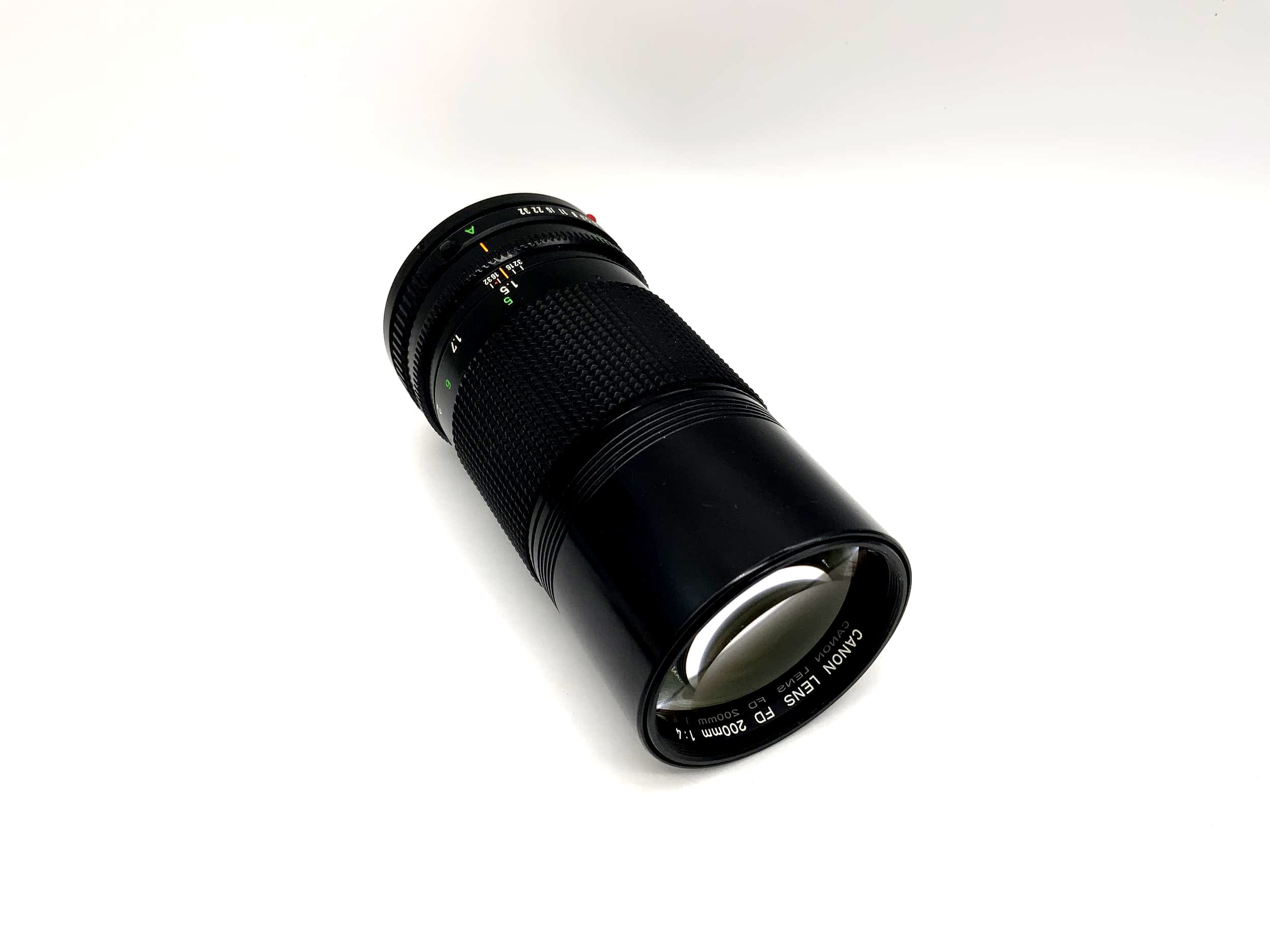 Canon 200mm 1:4 lens camera Camera Lens (Canon FD)
