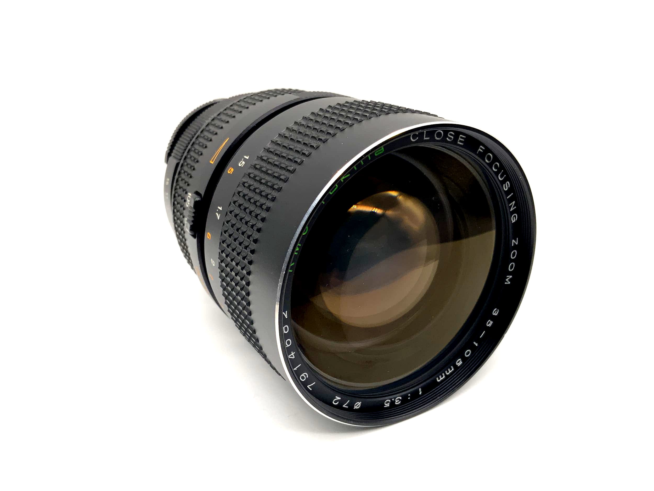 Tokina 35-105mm 1:3.5 Lens RMC Close Focusing Zoom Camera Lens (M42)