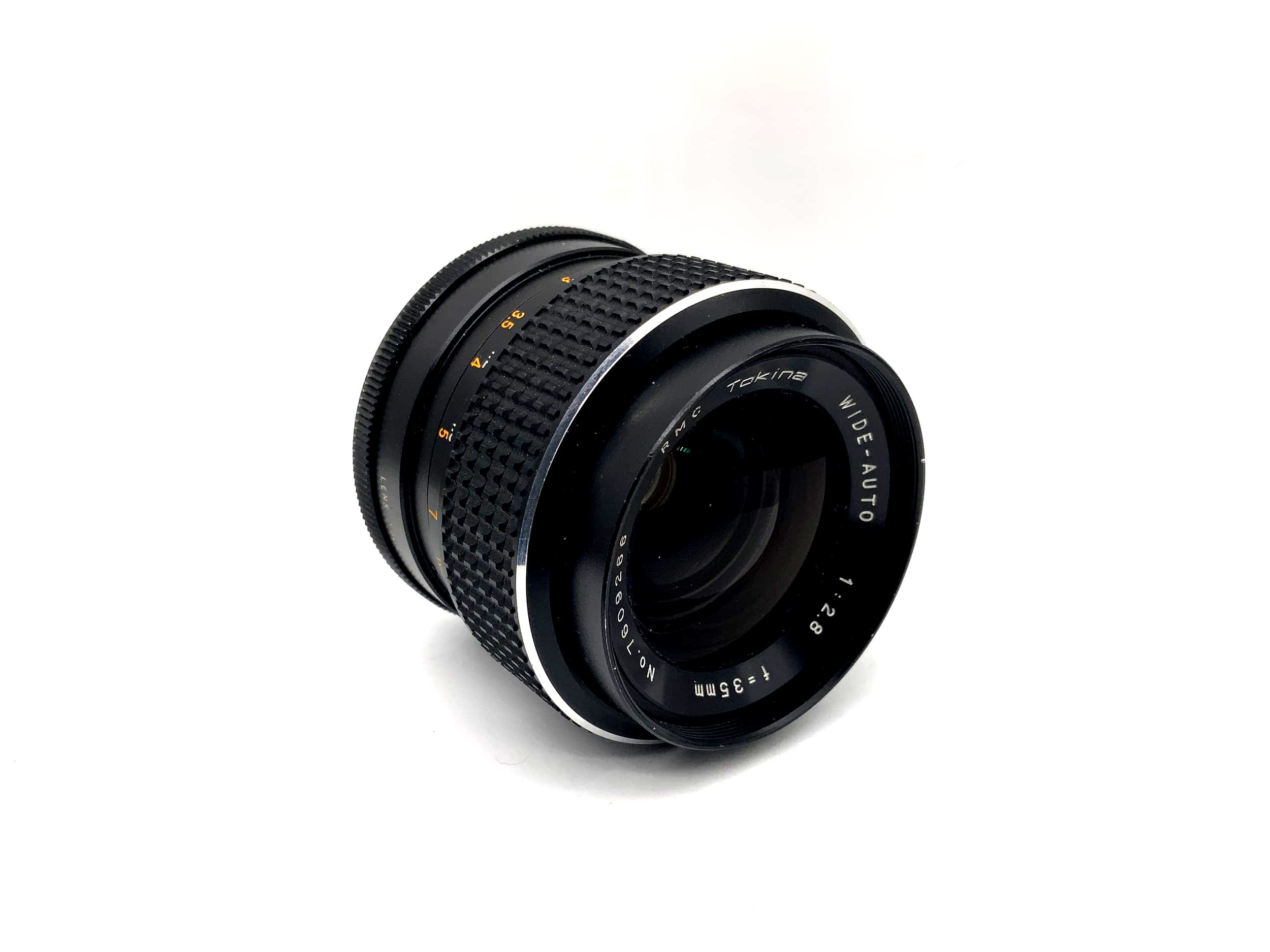 Tokina 35mm 1:2.8 Lens Wide-Auto RMC Camera Lens (Minolta MD)