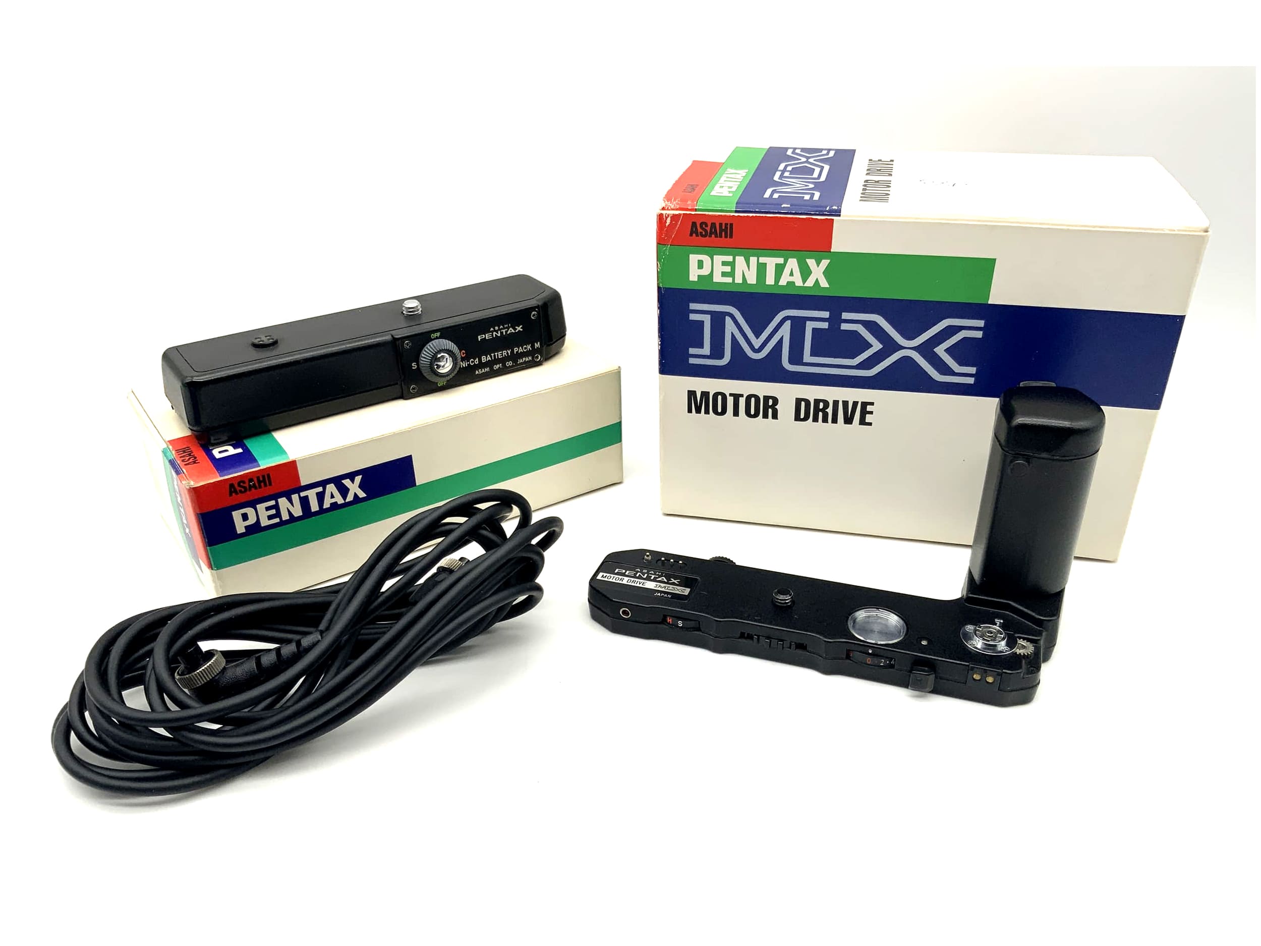 Asahi Pentax Motor Drive MX with Ni-Cd Battery Pack M in original packaging film transport