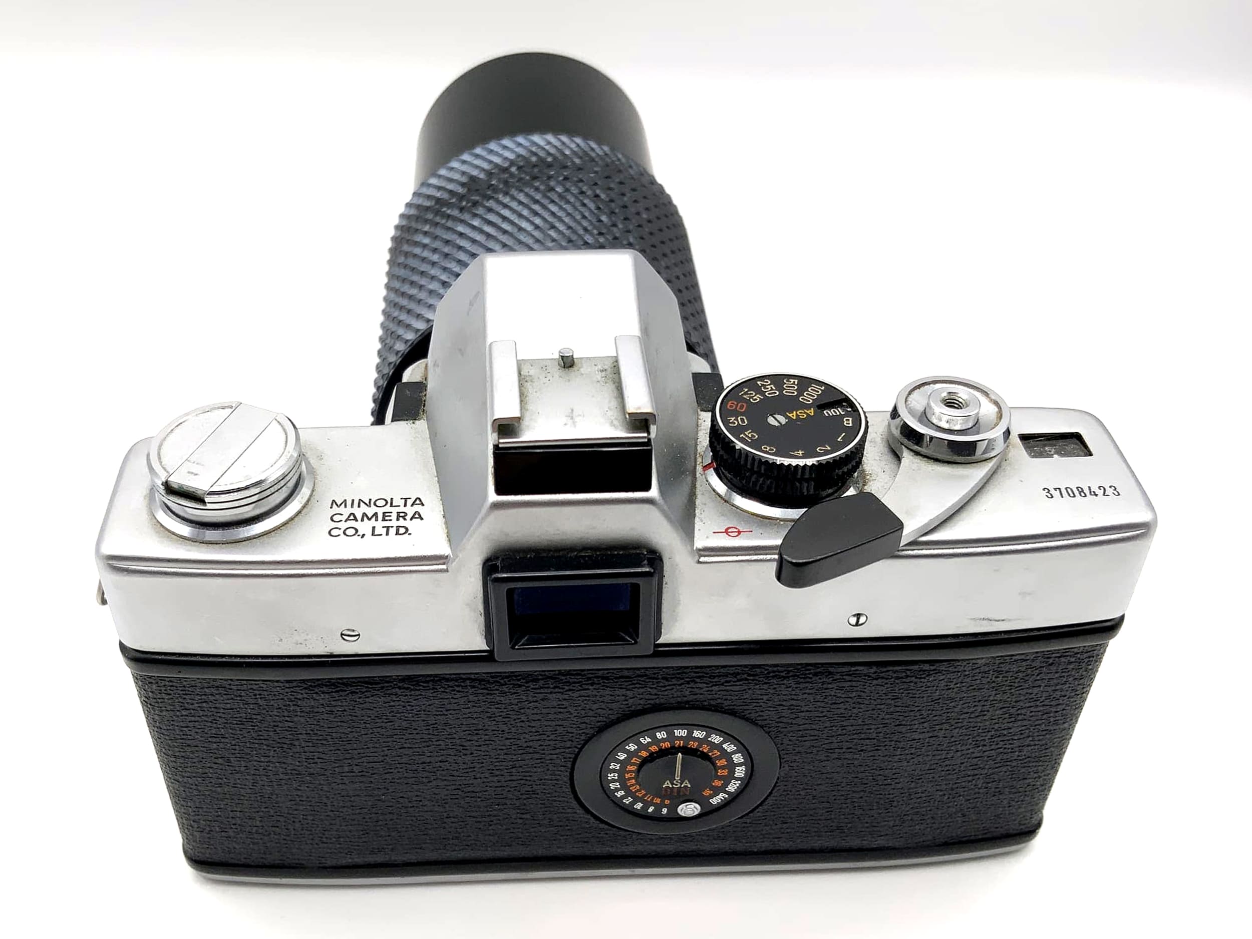 Minolta SRT101 with Tokina 4.5 80-200mm lens, 35mm analog SLR camera
