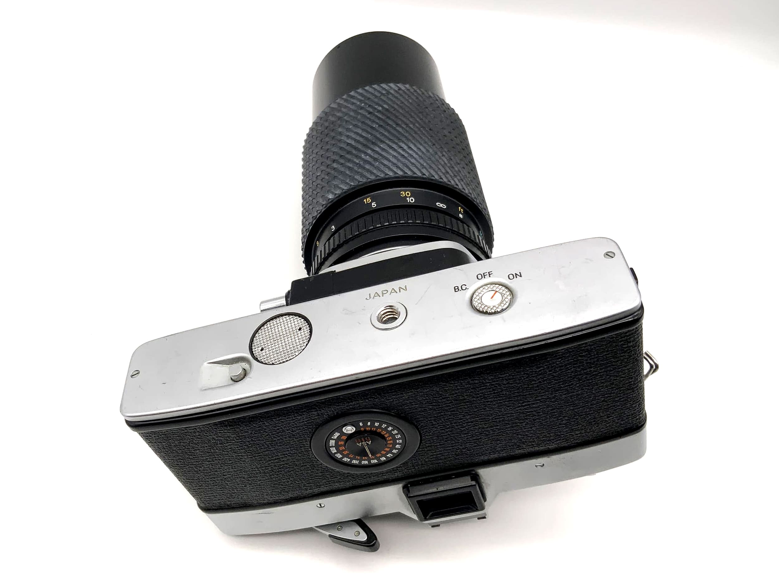 Minolta SRT101 with Tokina 4.5 80-200mm lens, 35mm analog SLR camera