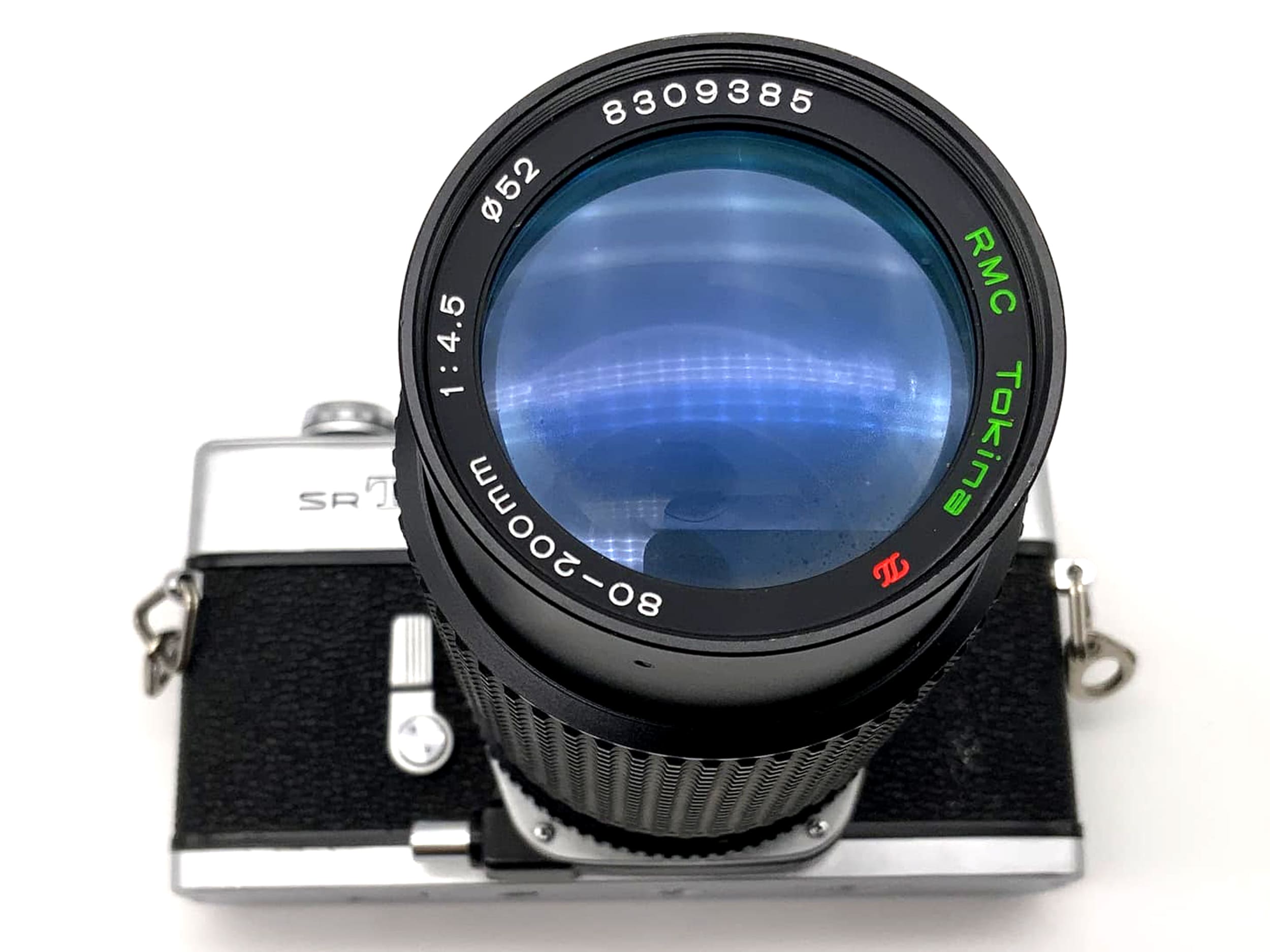 Minolta SRT101 with Tokina RMC 4.5 80-200mm SLR camera, 35mm analog
