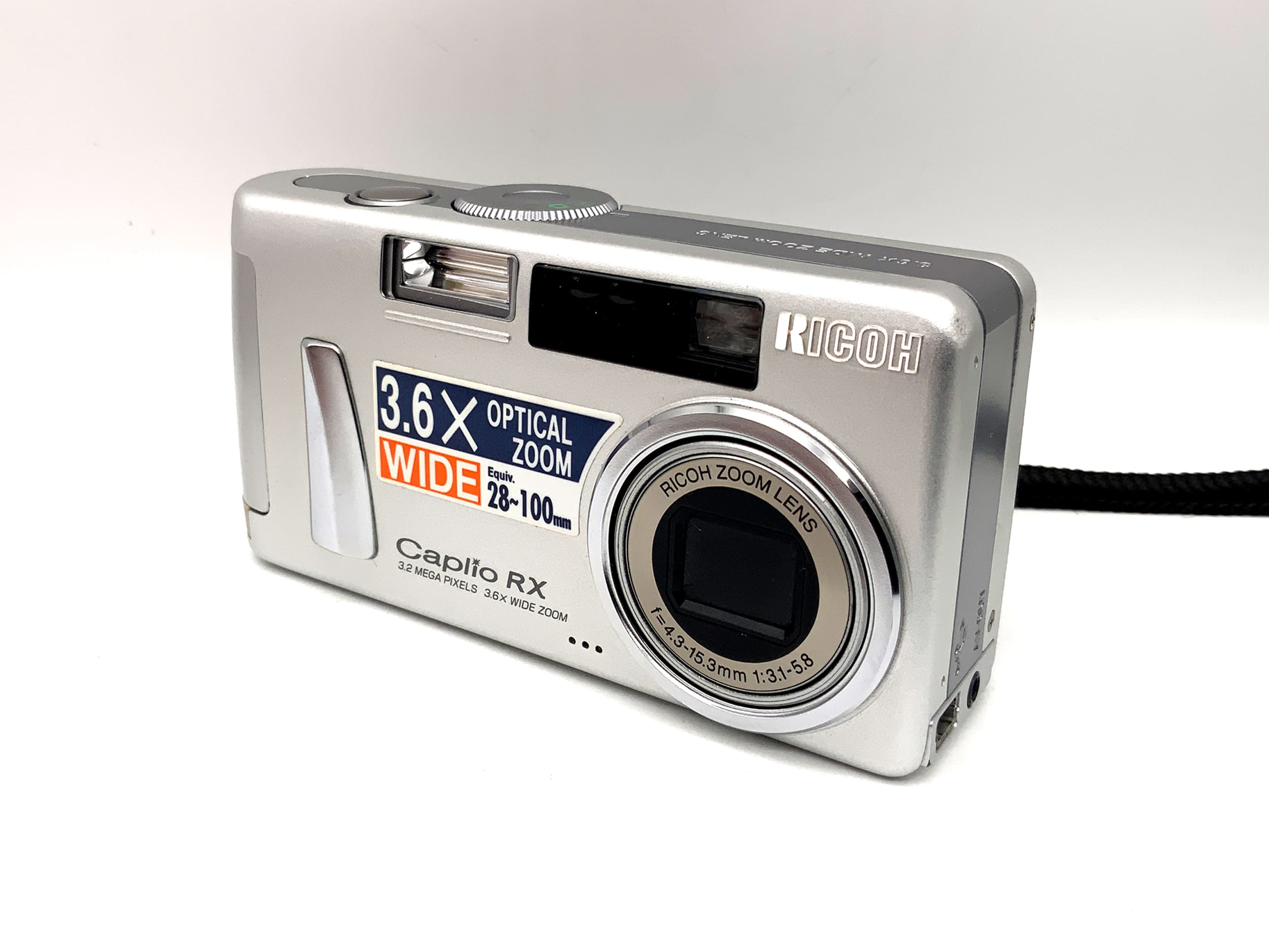 Ricoh Caplio RX Digital Compact Camera with Zoom Lens f=4.3-15.3mm 1:3.1-5.8