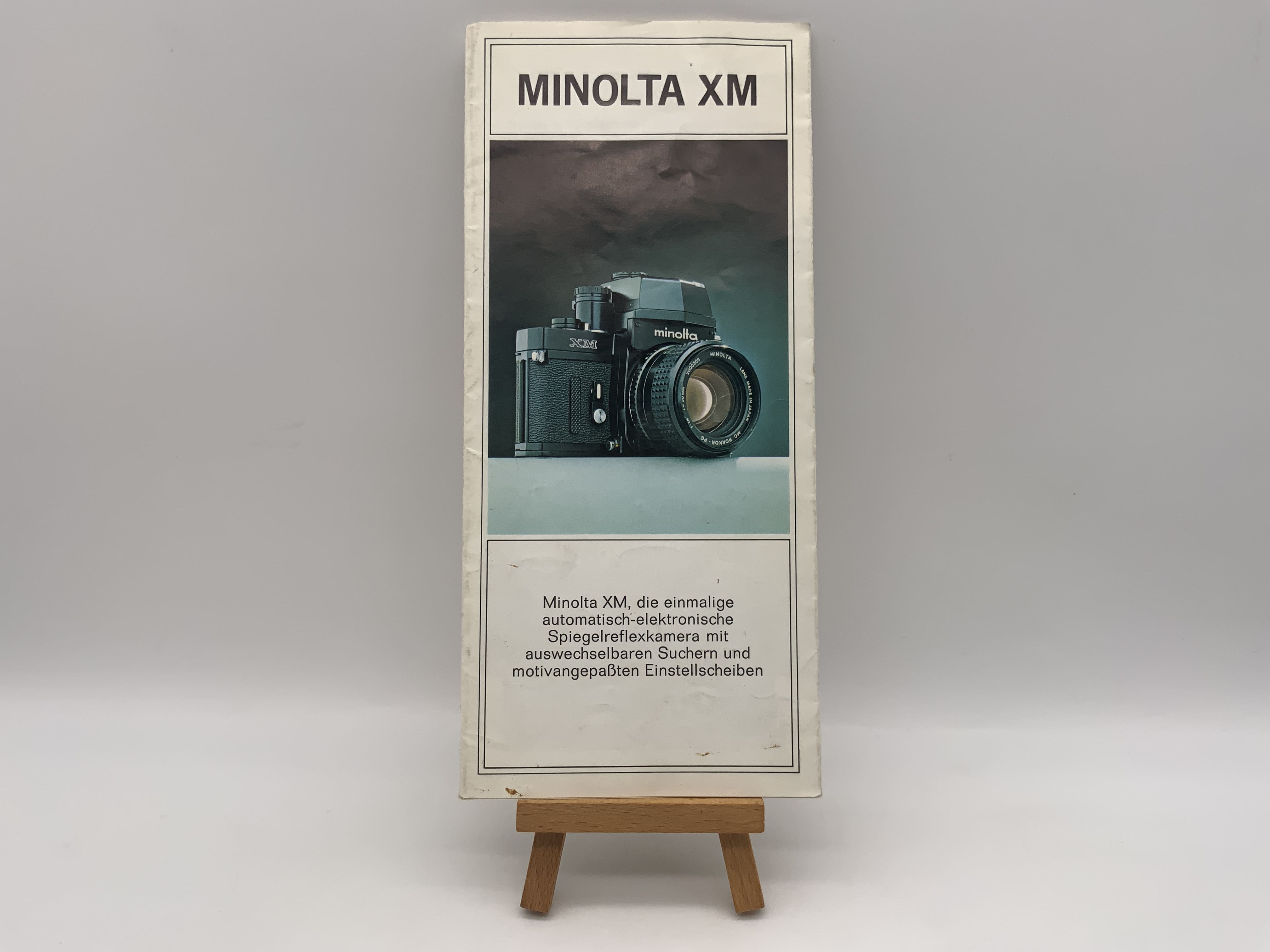 Minolta XM, the unique automatic-electronic SLR. Brochure (German).
