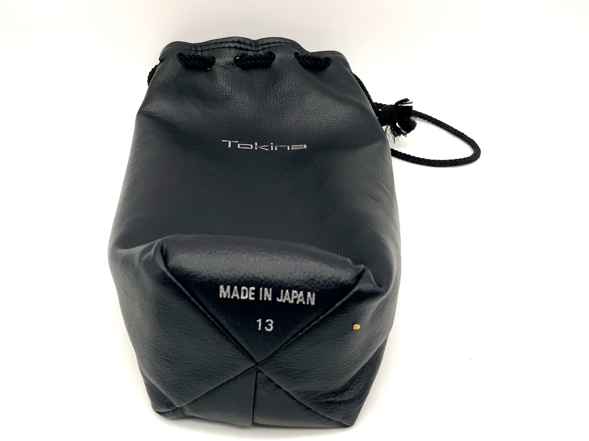 Tokina 13 quiver, black, approx. 18x7cm. Lens case, soft case.