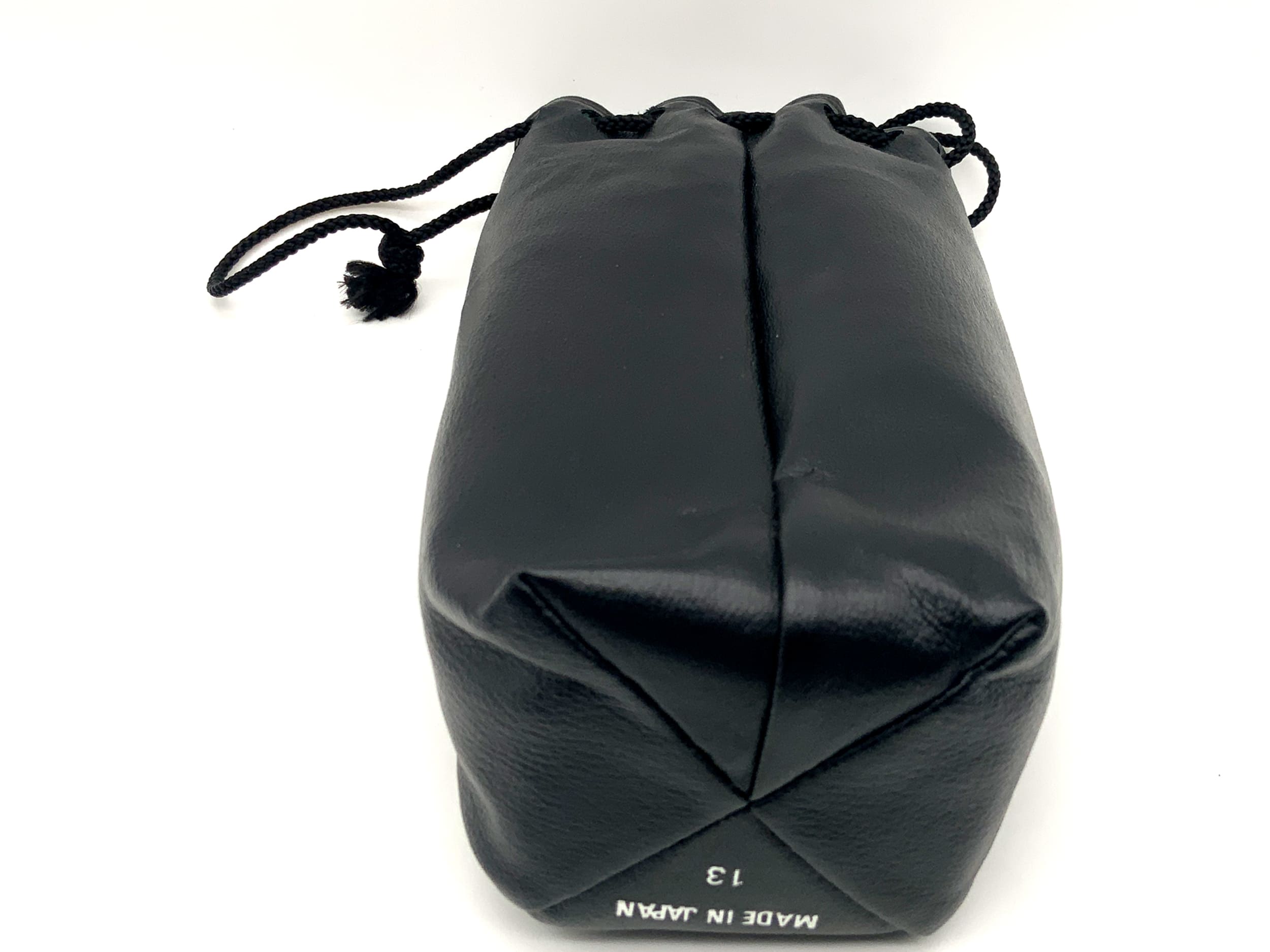 Tokina 13 quiver, black, approx. 18x7cm. Lens case, soft case.