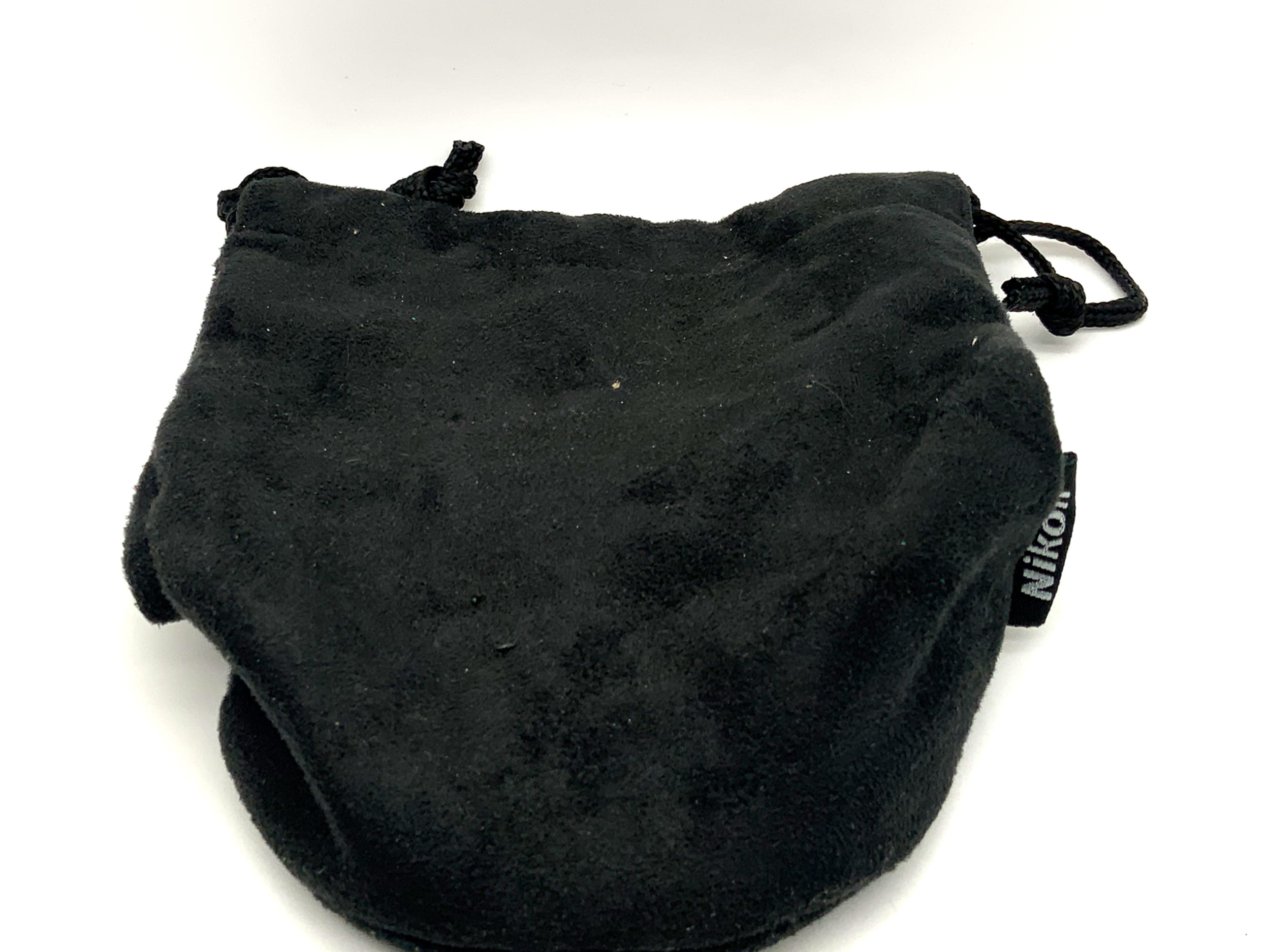 Nikon lens case, black, approx. 16x9.5cm, soft case.