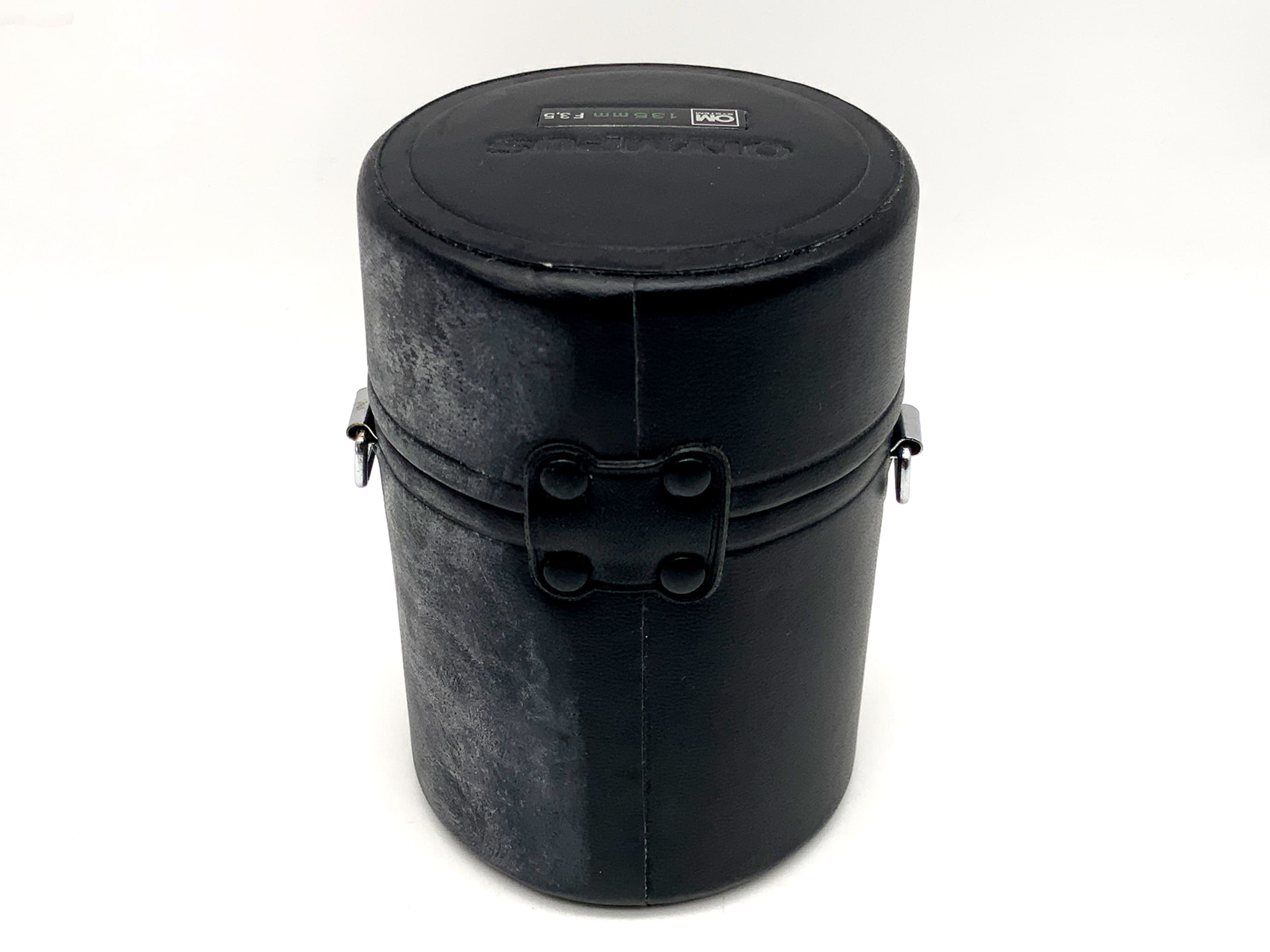 Olympus lens case, black, approx. 11x7.5cm, for OM System 135mm F3.5 lens.