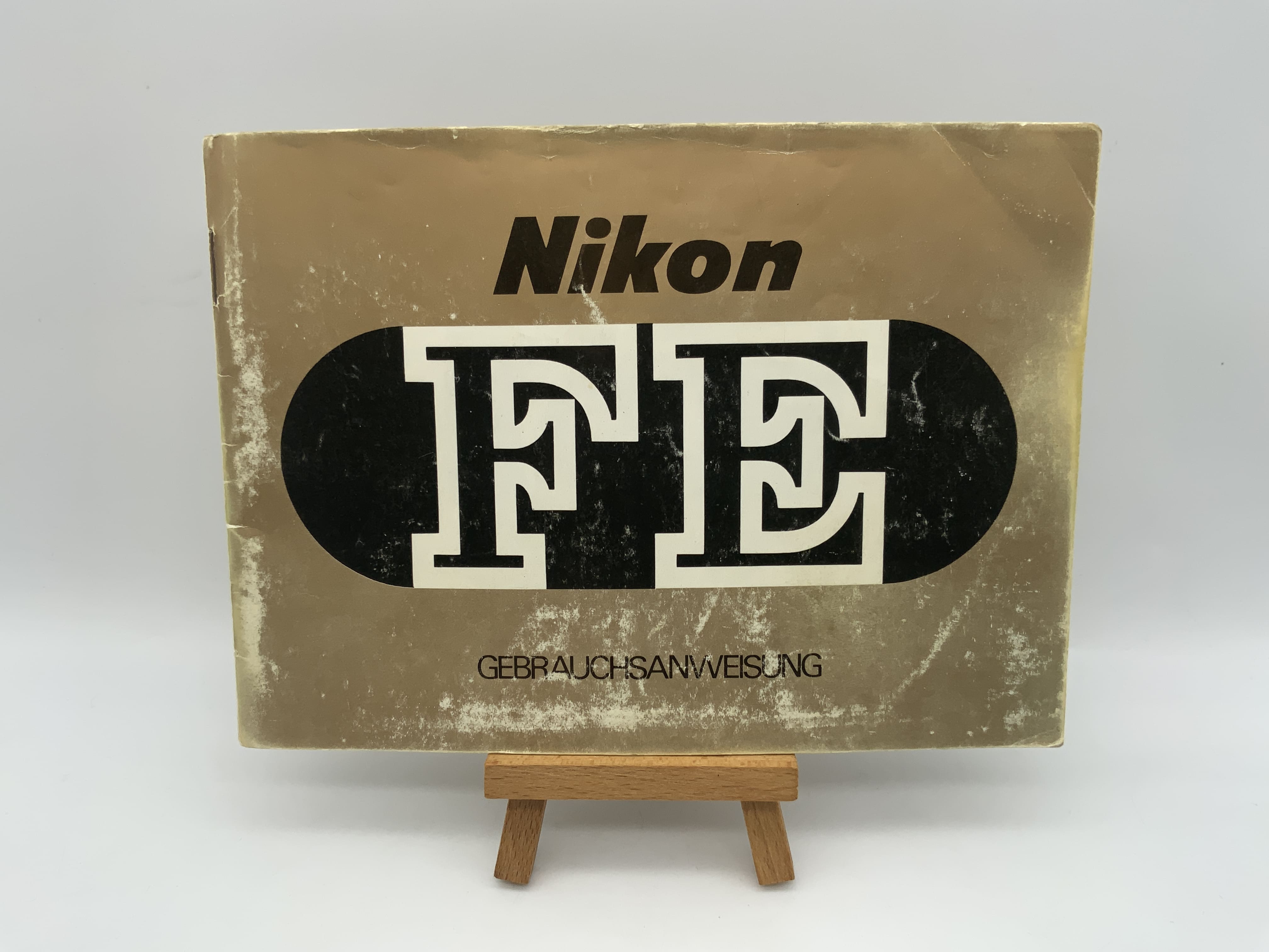 Nikon FE! Heavily used! User manual in German