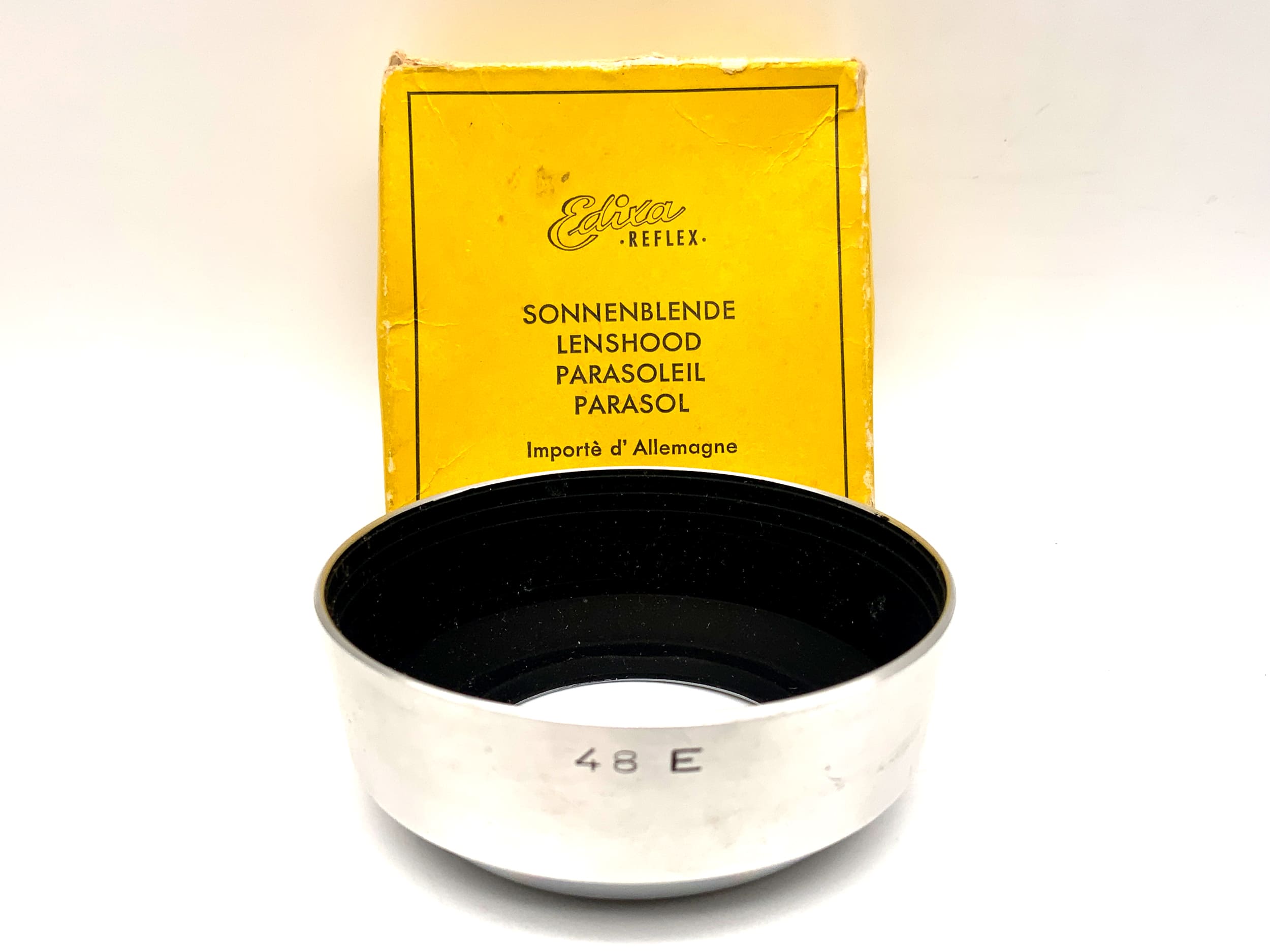 Edixa Reflex 48 E lens hood, aluminum, in original packaging.