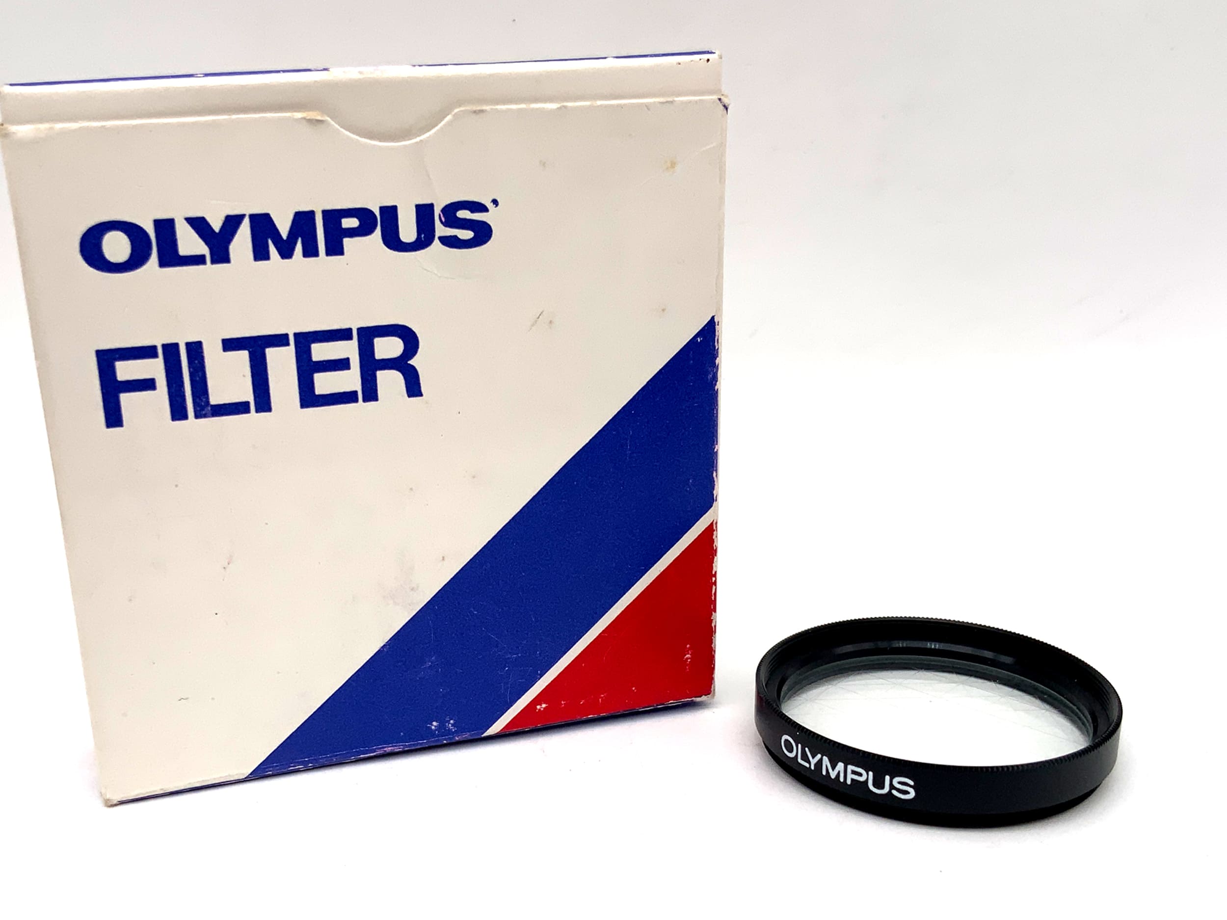 Olympus Sunnycross grid filter in original packaging, 35.5mm circular filter thread