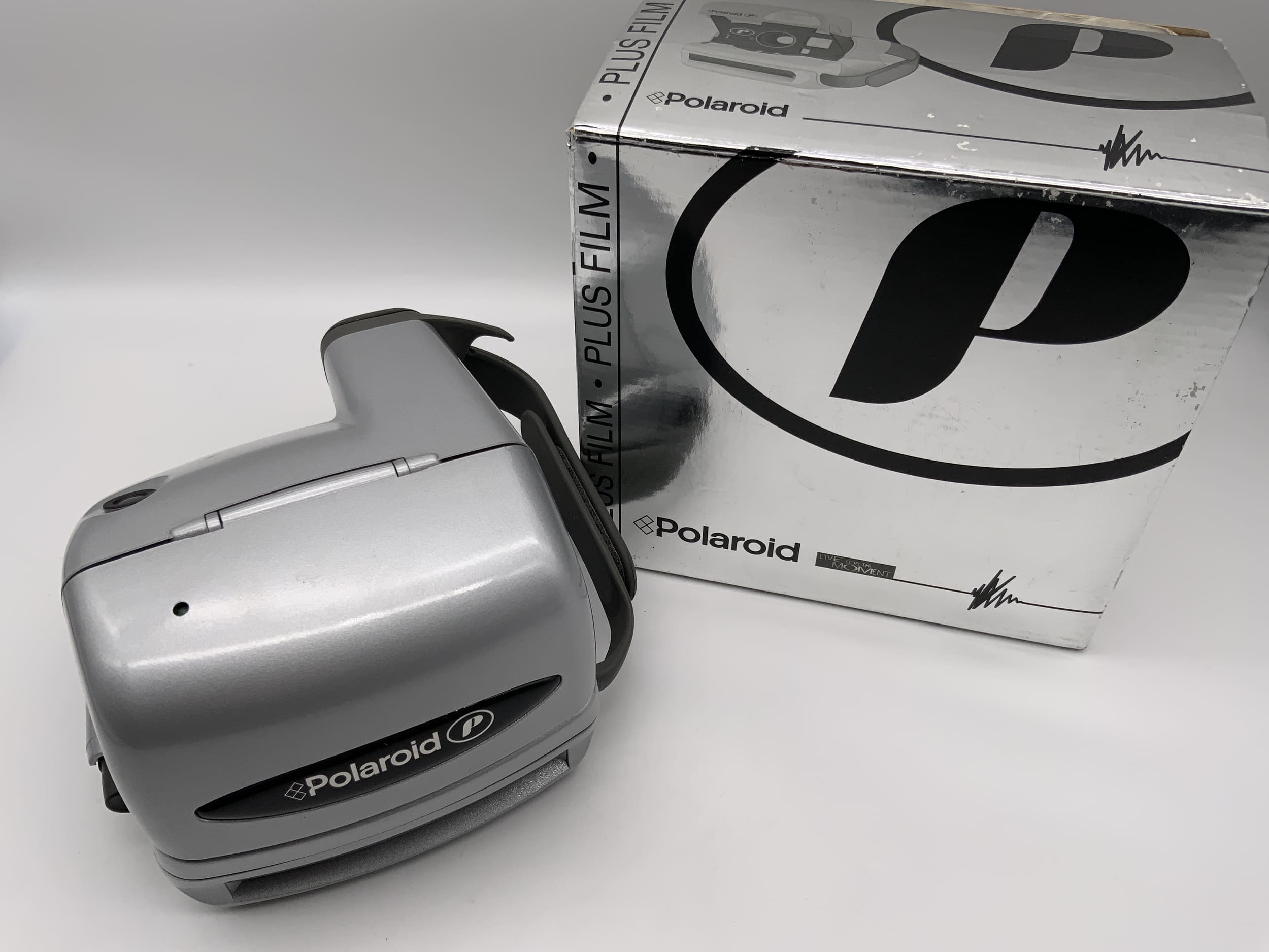 Polaroid P 600 compact camera, silver, in original packaging, without film