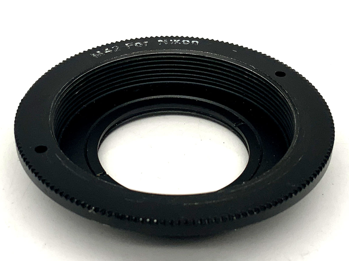 Lens adapter with infinity focus glass, lens mount converter (M42 -> Nikon F)