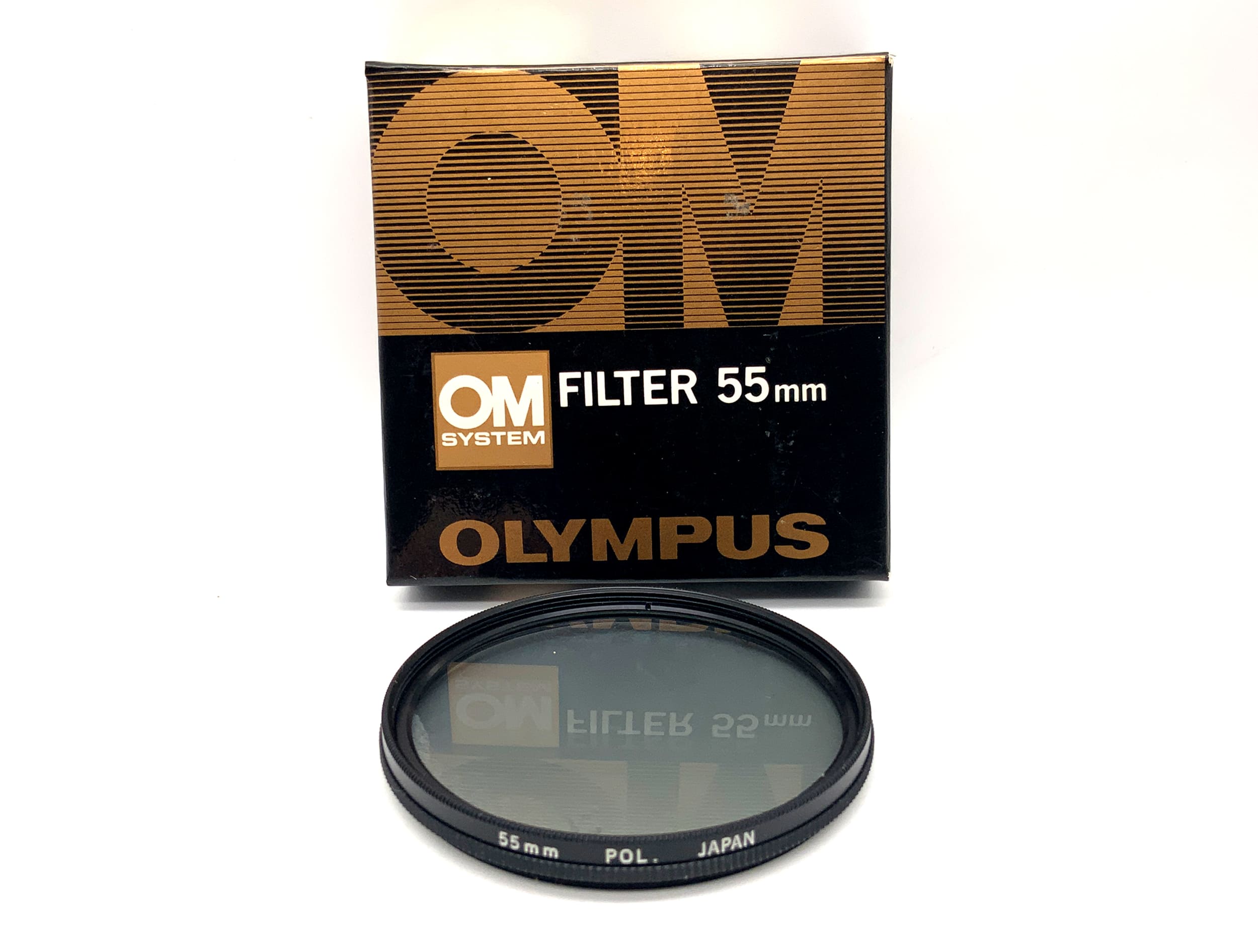 Olympus polarizing filter in original packaging, 55mm circular filter thread