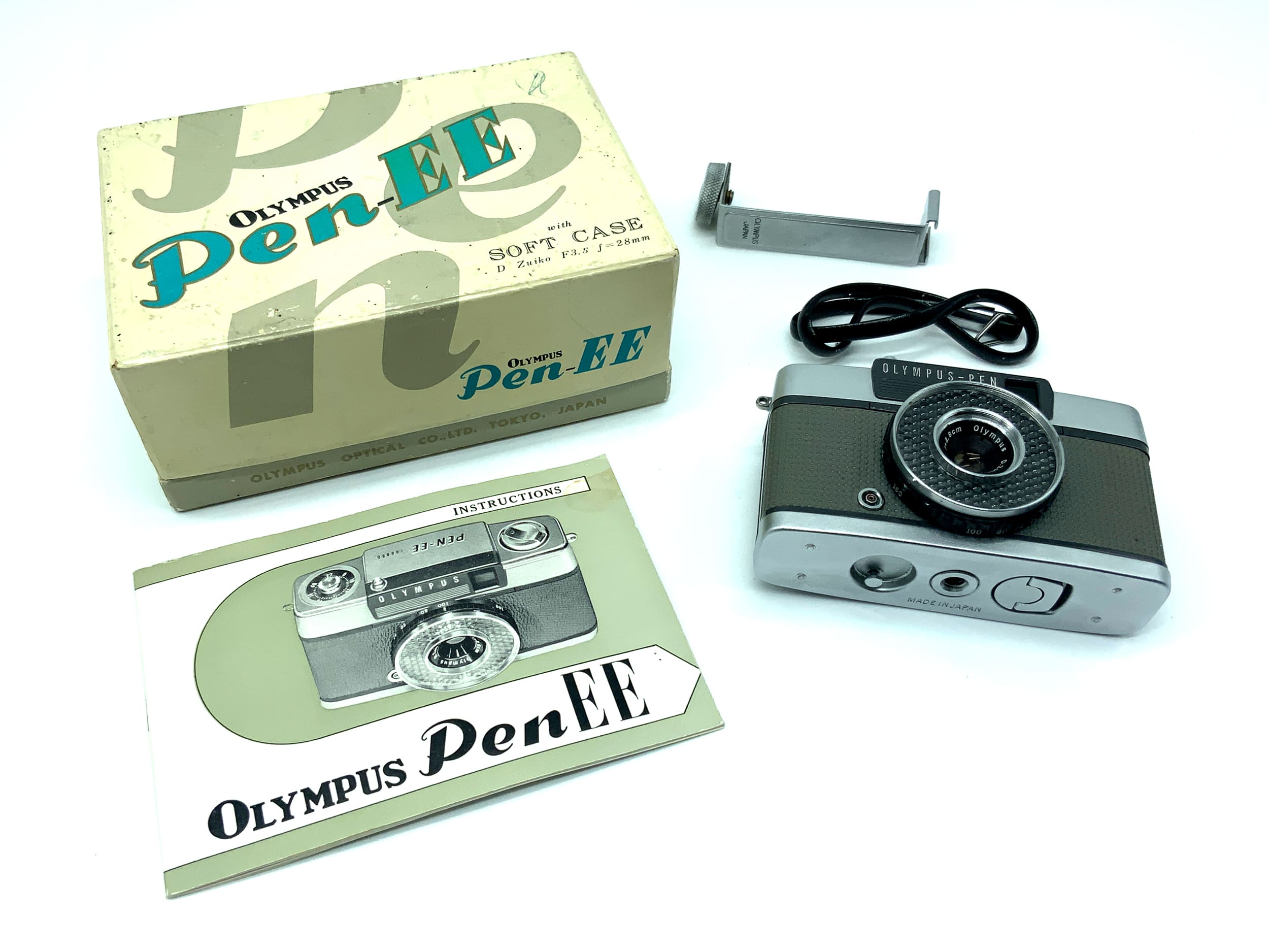Olympus PEN-EE rangefinder camera with D.Zuiko 28mm 1:3.5 lens in original packaging, analog camera