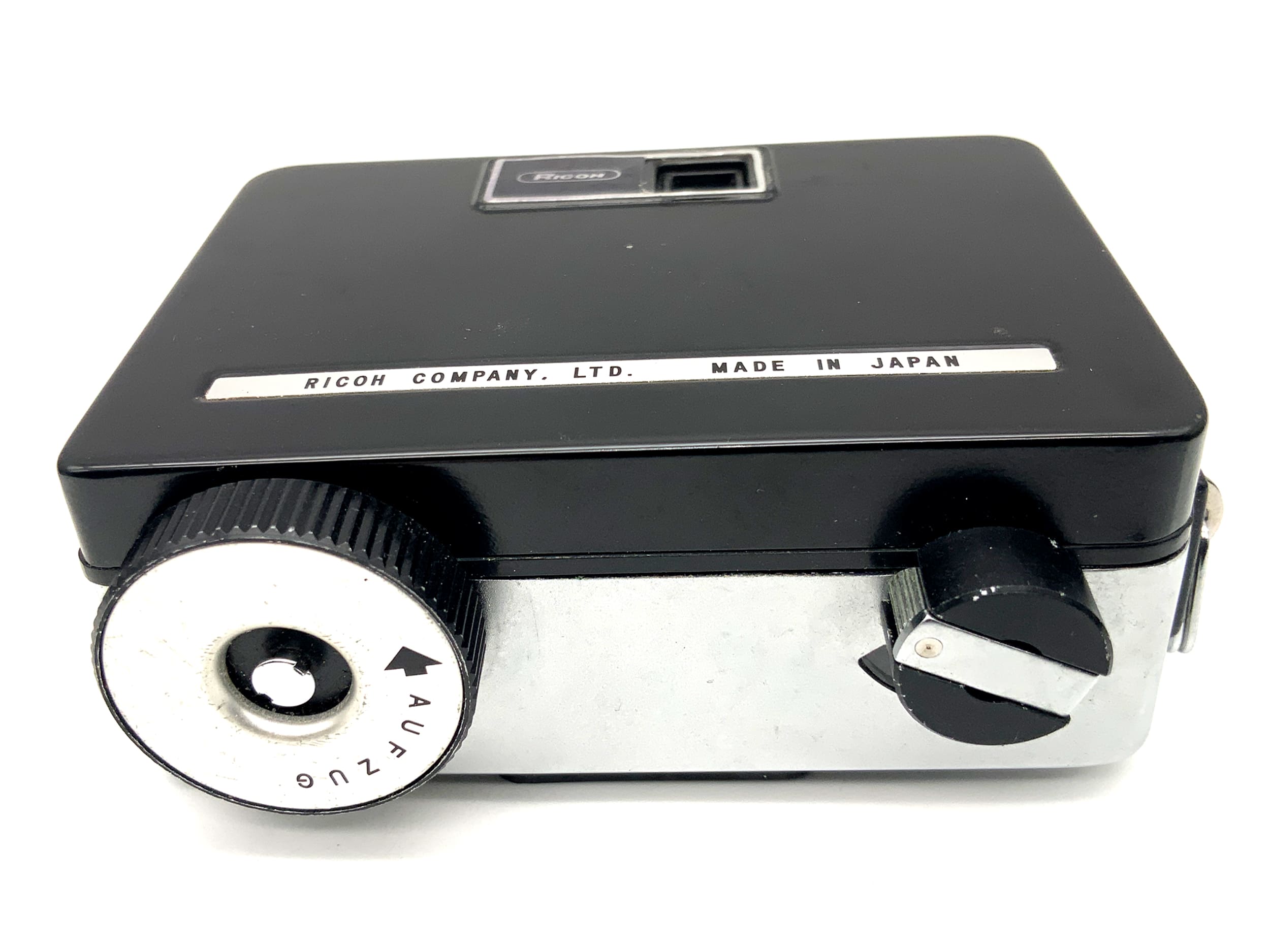 Ricoh Revue Auto Half S viewfinder camera with Ricoh 25mm F:2.8 half-frame lens