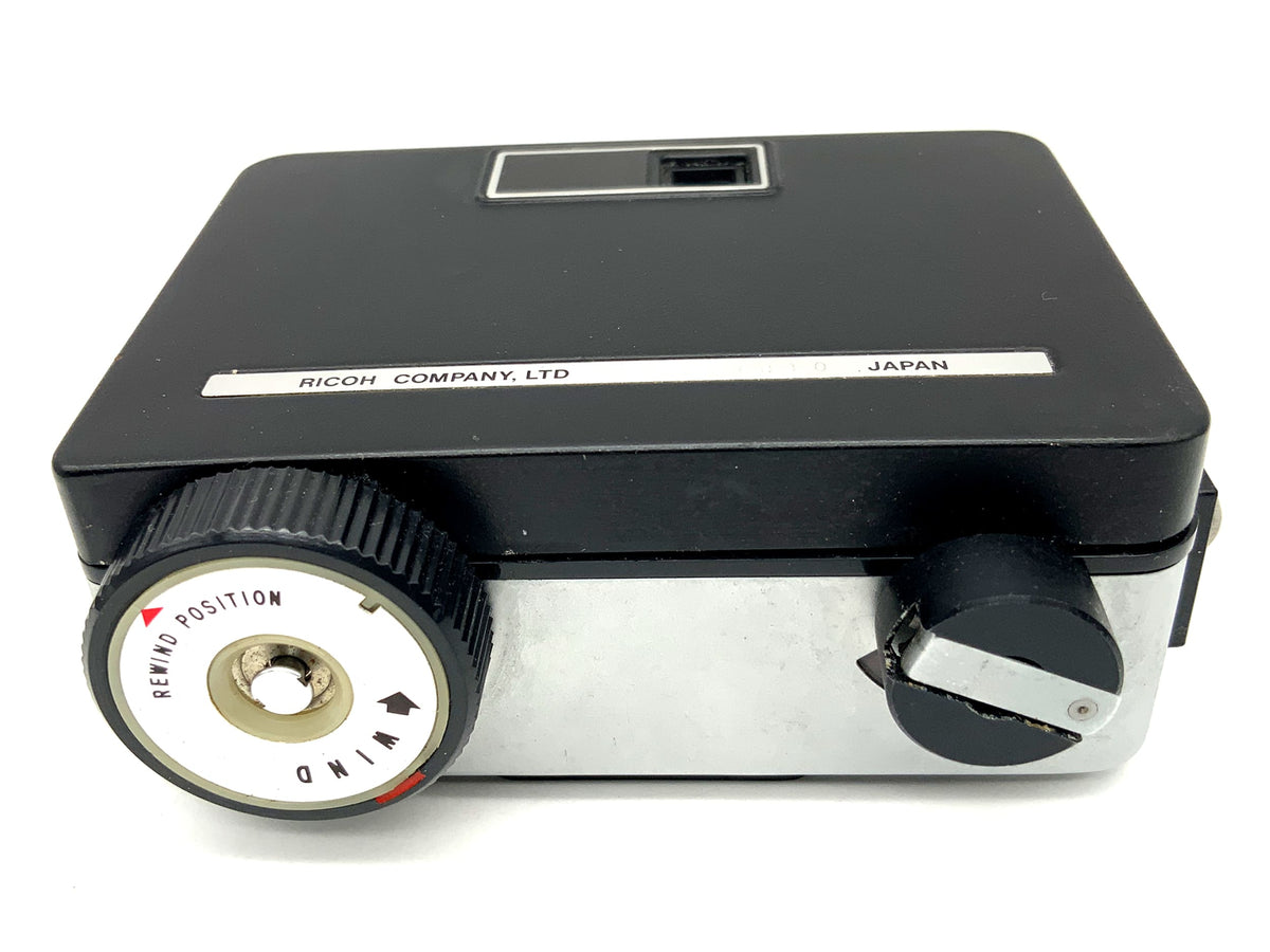 Ricoh Auto Half SE2 viewfinder camera with Ricoh 25mm F:2.8 half-frame camera