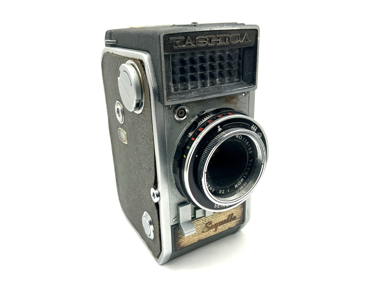 Yashica Sequelle viewfinder camera with Yashinon 28mm 1:2.8 half-frame camera