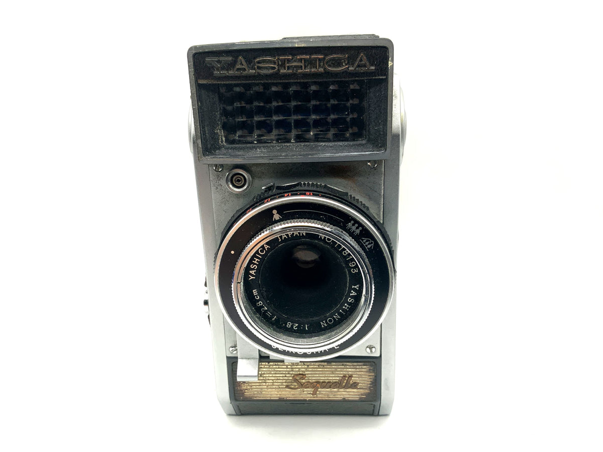 Yashica Sequelle viewfinder camera with Yashinon 28mm 1:2.8 half-frame camera