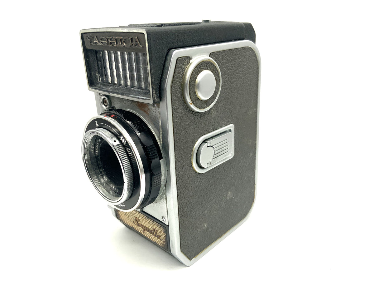 Yashica Sequelle viewfinder camera with Yashinon 28mm 1:2.8 half-frame camera
