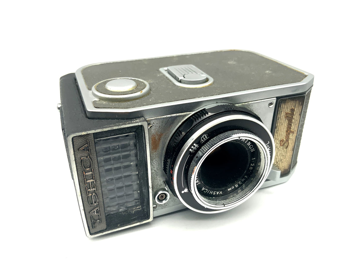 Yashica Sequelle viewfinder camera with Yashinon 28mm 1:2.8 half-frame camera