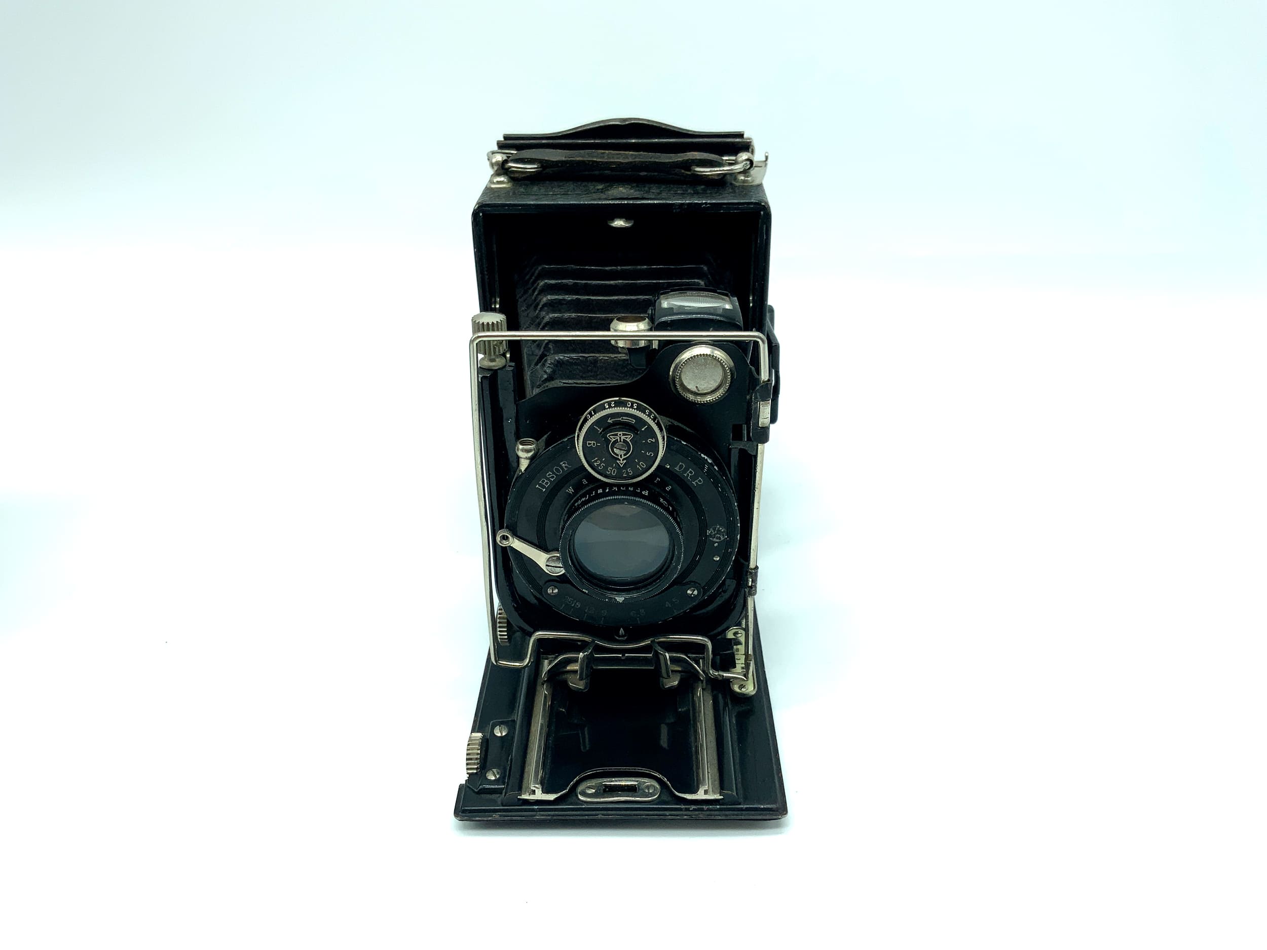 Wauckosin Wara plate camera with Plaubel Pecomat 10.5cm 1:4.5 lens with Rollex patent