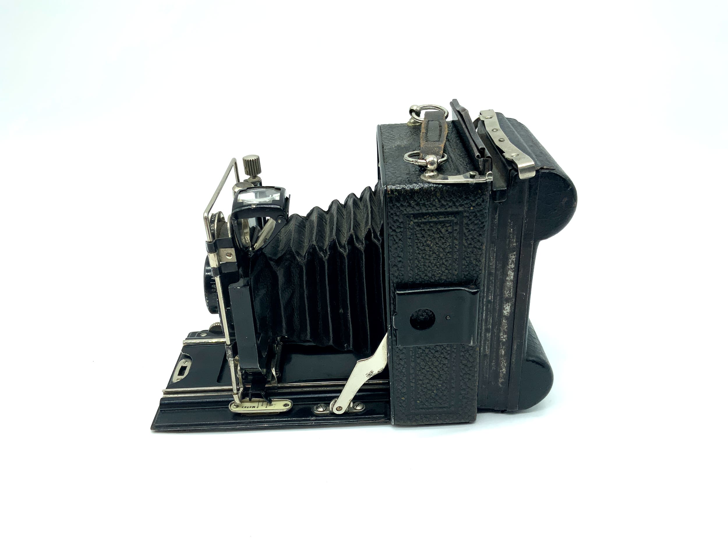 Wauckosin Wara plate camera with Plaubel Pecomat 10.5cm 1:4.5 lens with Rollex patent