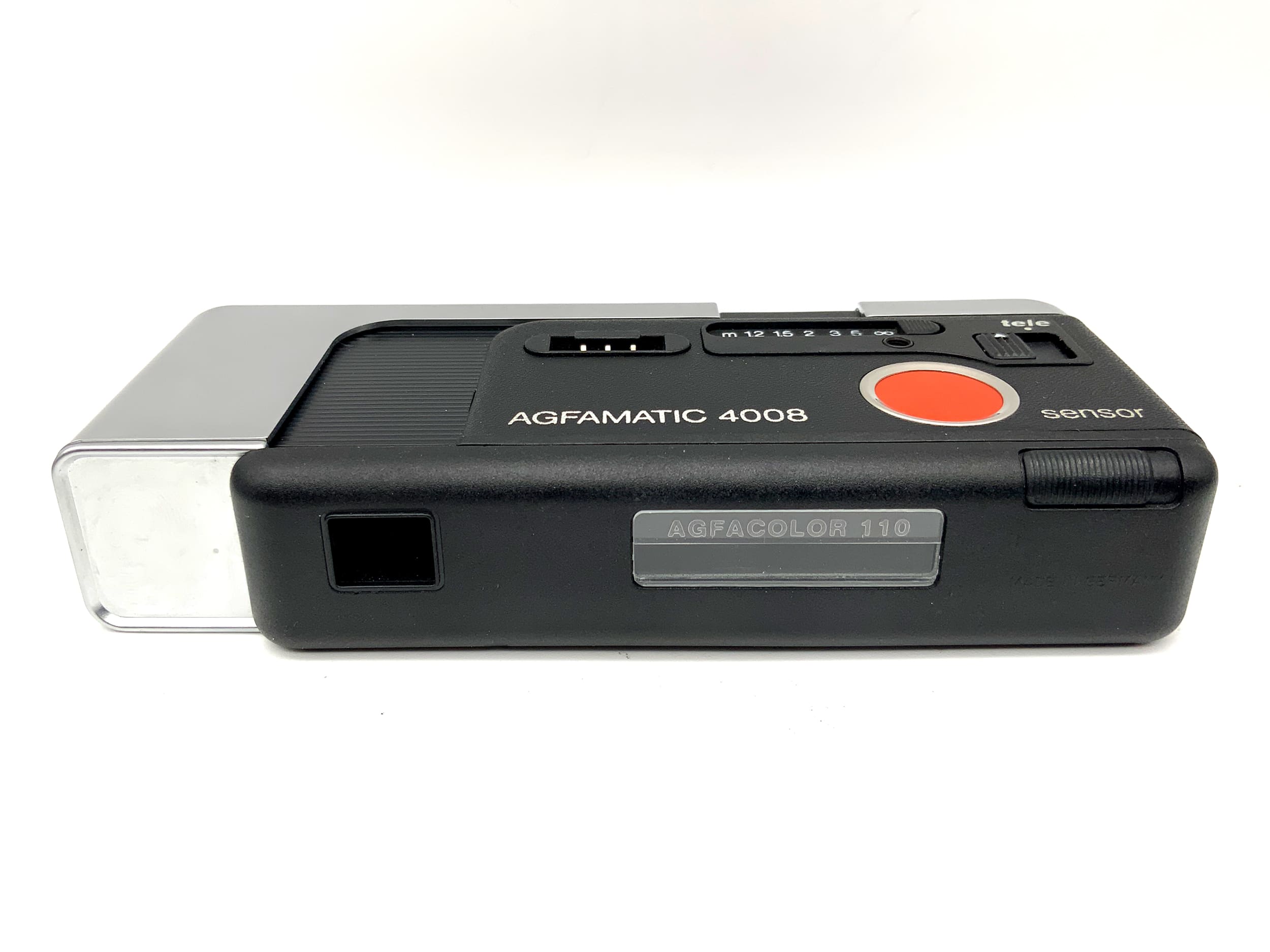 Agfa Agfamatic 4008 viewfinder camera with Color Apotar miniature analog camera