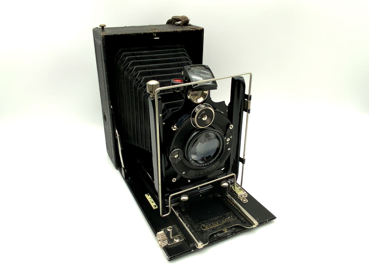 Certo Sport plate camera with double anastigmat, unofocal 1:4.5/13.5cm Compur 0