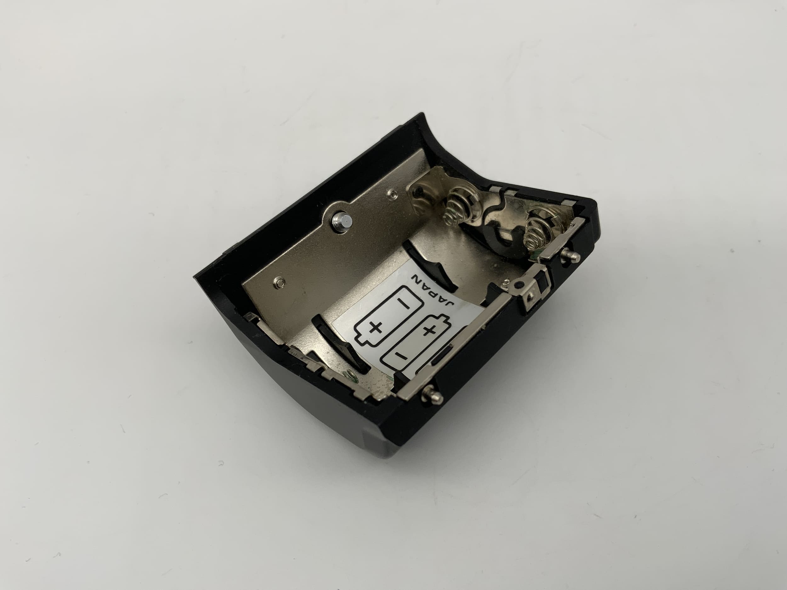 Revue AC 4 battery compartment cover