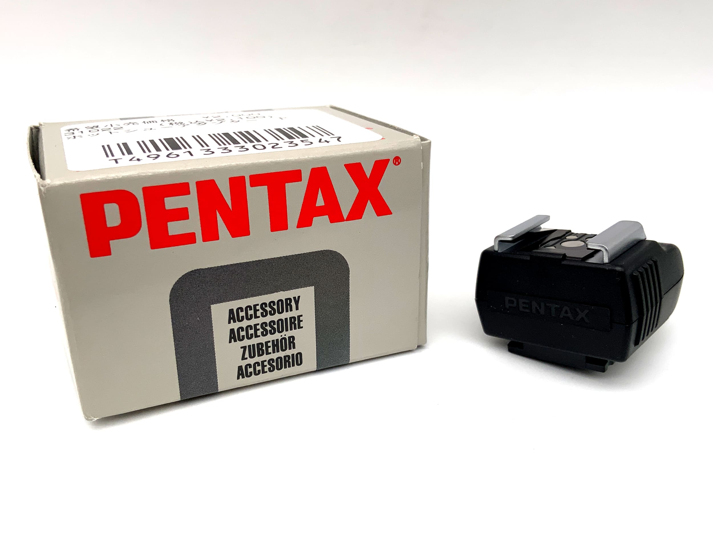 Pentax hot shoe adapter, flash adapter, flash holder in original packaging