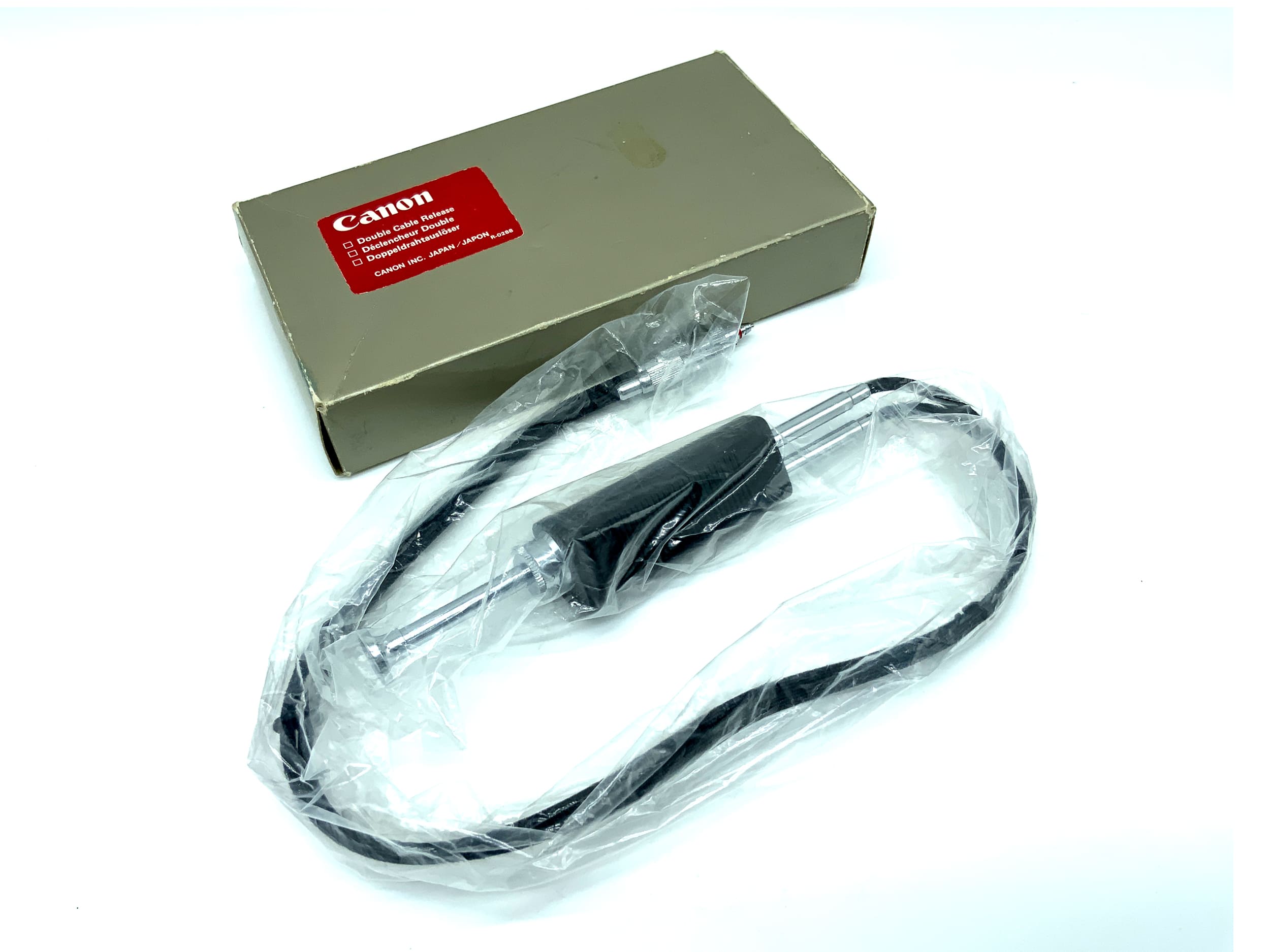 Canon R-0288 Double cable release, black, approx. 50cm, with locking mechanism, in original packaging