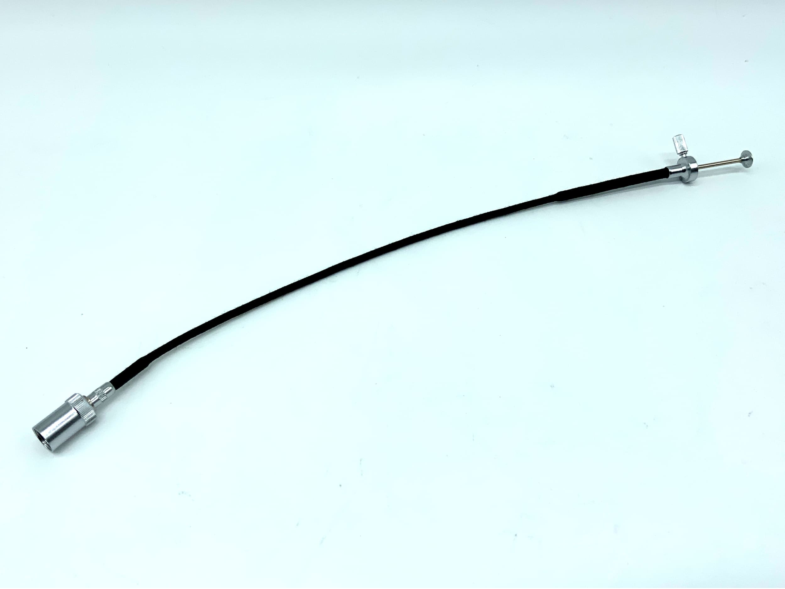 Leitz Leica cable release, black, approx. 25cm, with locking mechanism and bell.