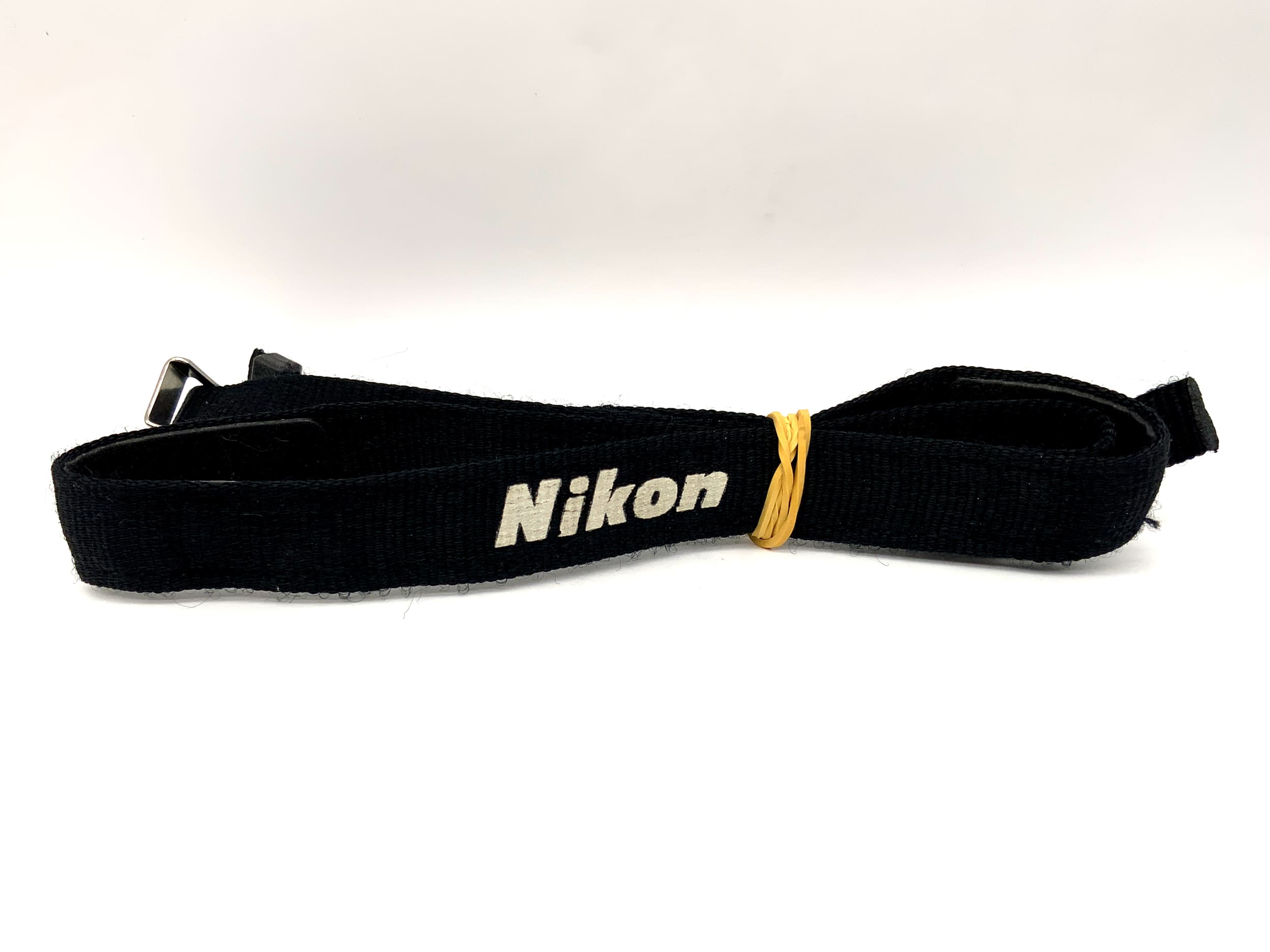 Nikon approx. 20mm wide black neck/shoulder camera strap