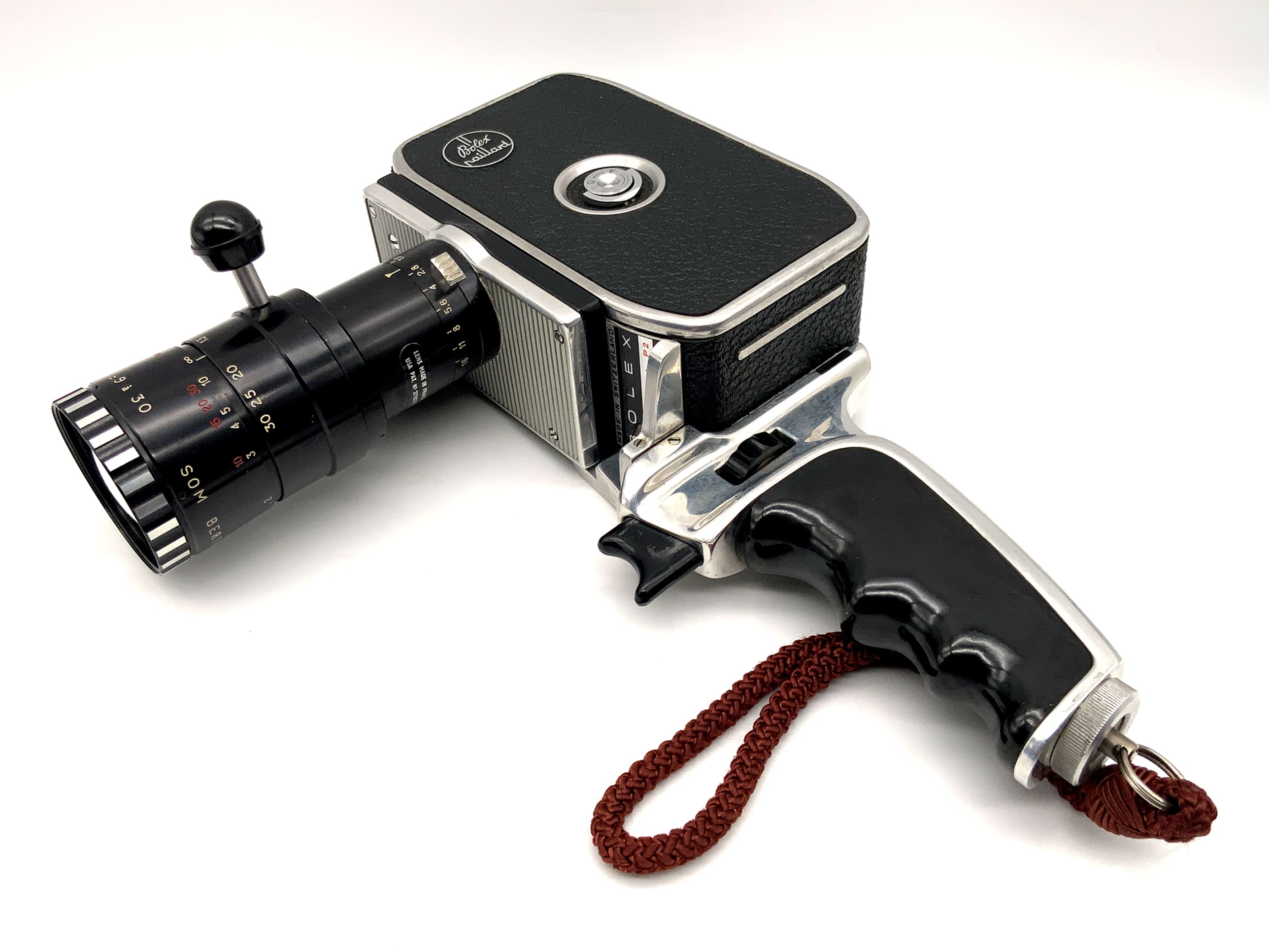 Bolex Paillard Zoom Reflex P2 film camera with 1:1.9 f=9-30mm lens and grip with dual 8mm lens